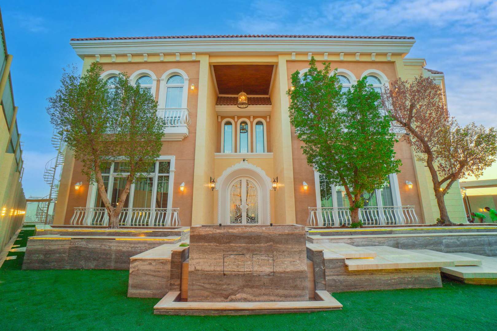Luxury six-bedroom villa exterior with gated entrance in Nad Al Sheba 4 for rent