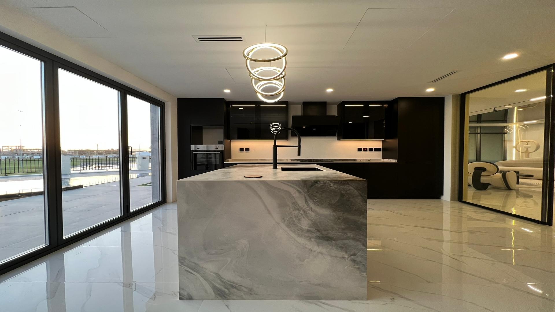 Luxurious villa pool with golf course views in Trevi, Damac Hills