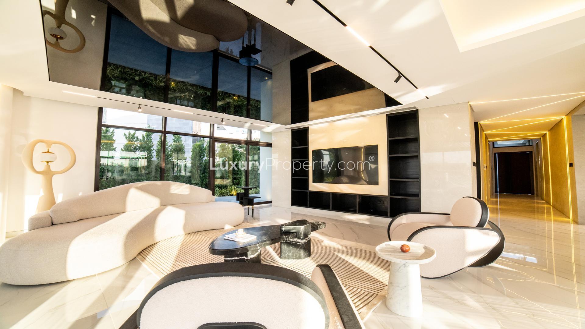 Modern villa exterior with sleek design, luxury car, located in Trevi, Damac Hills