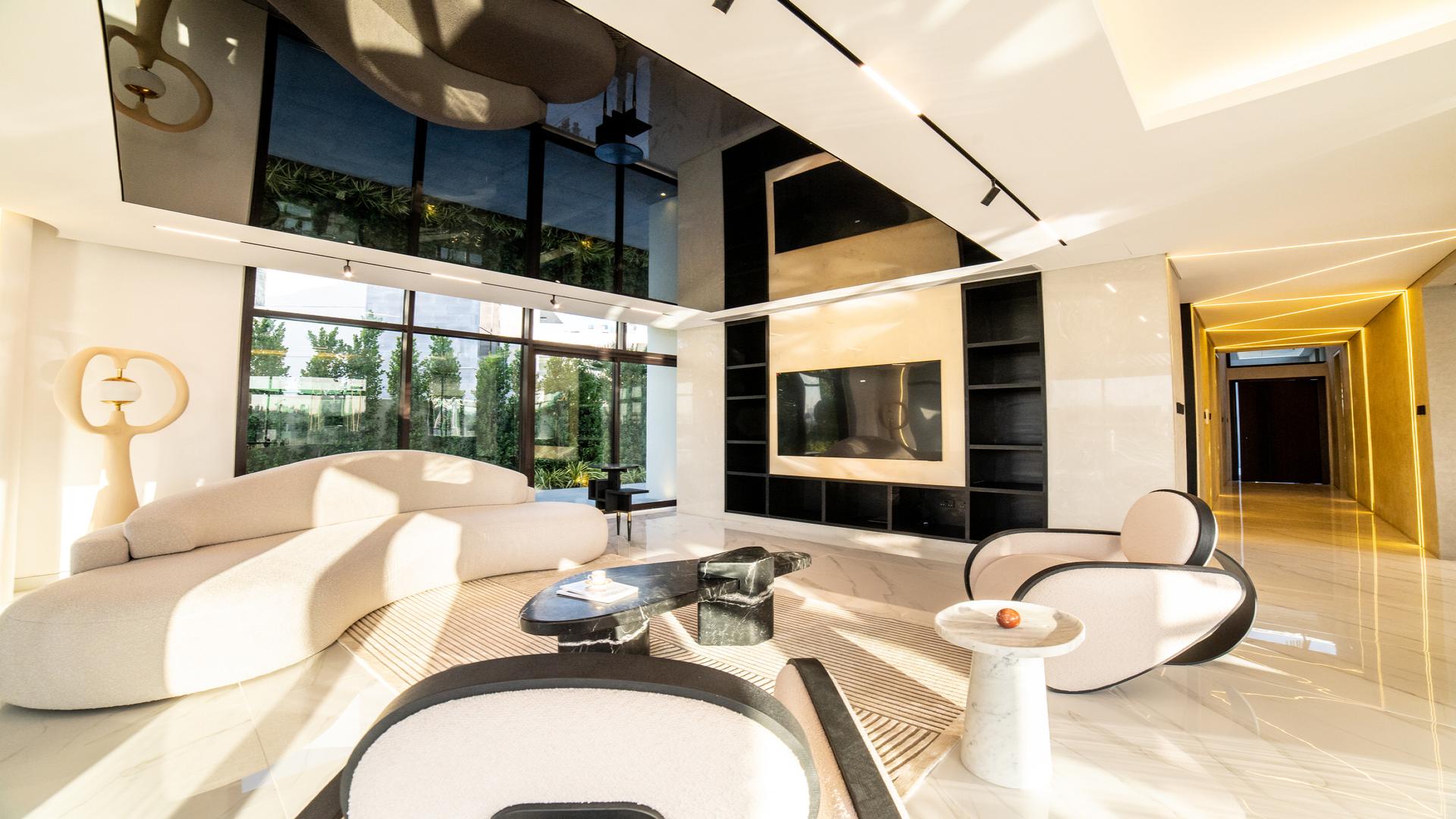 Modern villa exterior with sleek design, luxury car, located in Trevi, Damac Hills