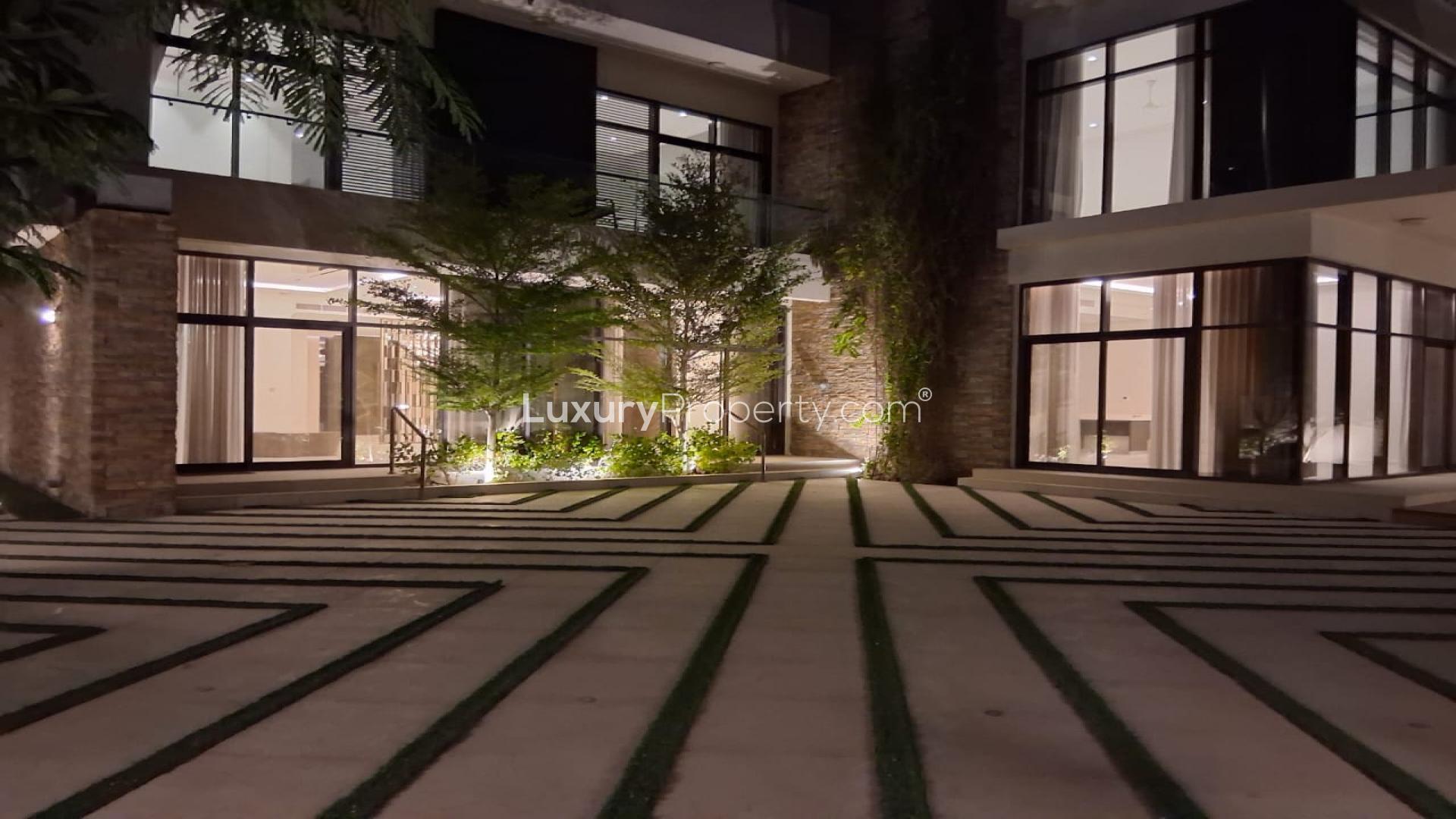 Luxury villa exterior with modern architecture in Damac Hills, Brookfield 1, golf course view