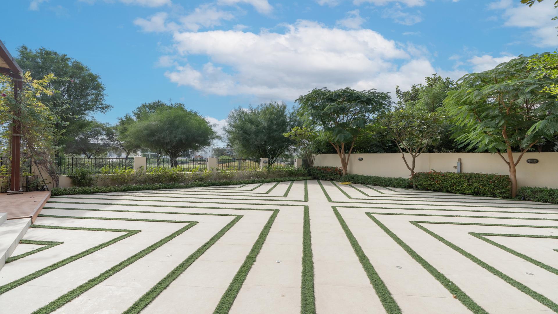 Luxury villa exterior with modern design in Damac Hills, Brookfield 1, for rent