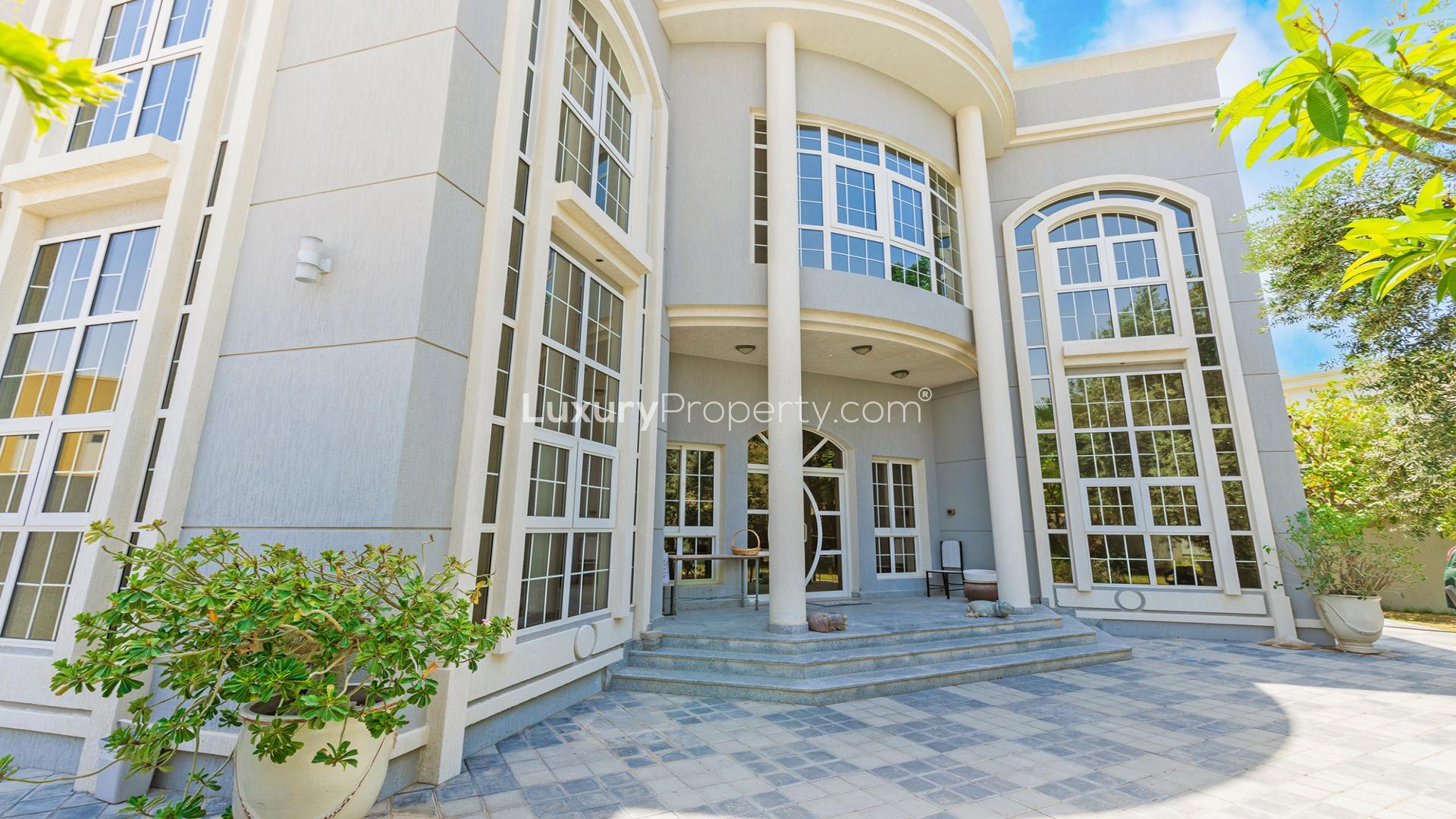 Fully upgraded gated villa exterior with landscaped garden in Al Barsha South for rent