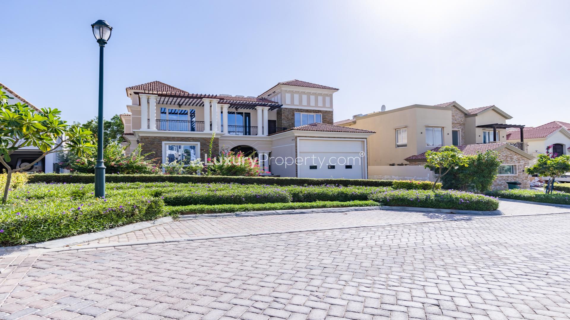 Grand villa exterior in Jumeirah Golf Estates, Earth community, luxury residential property for sale