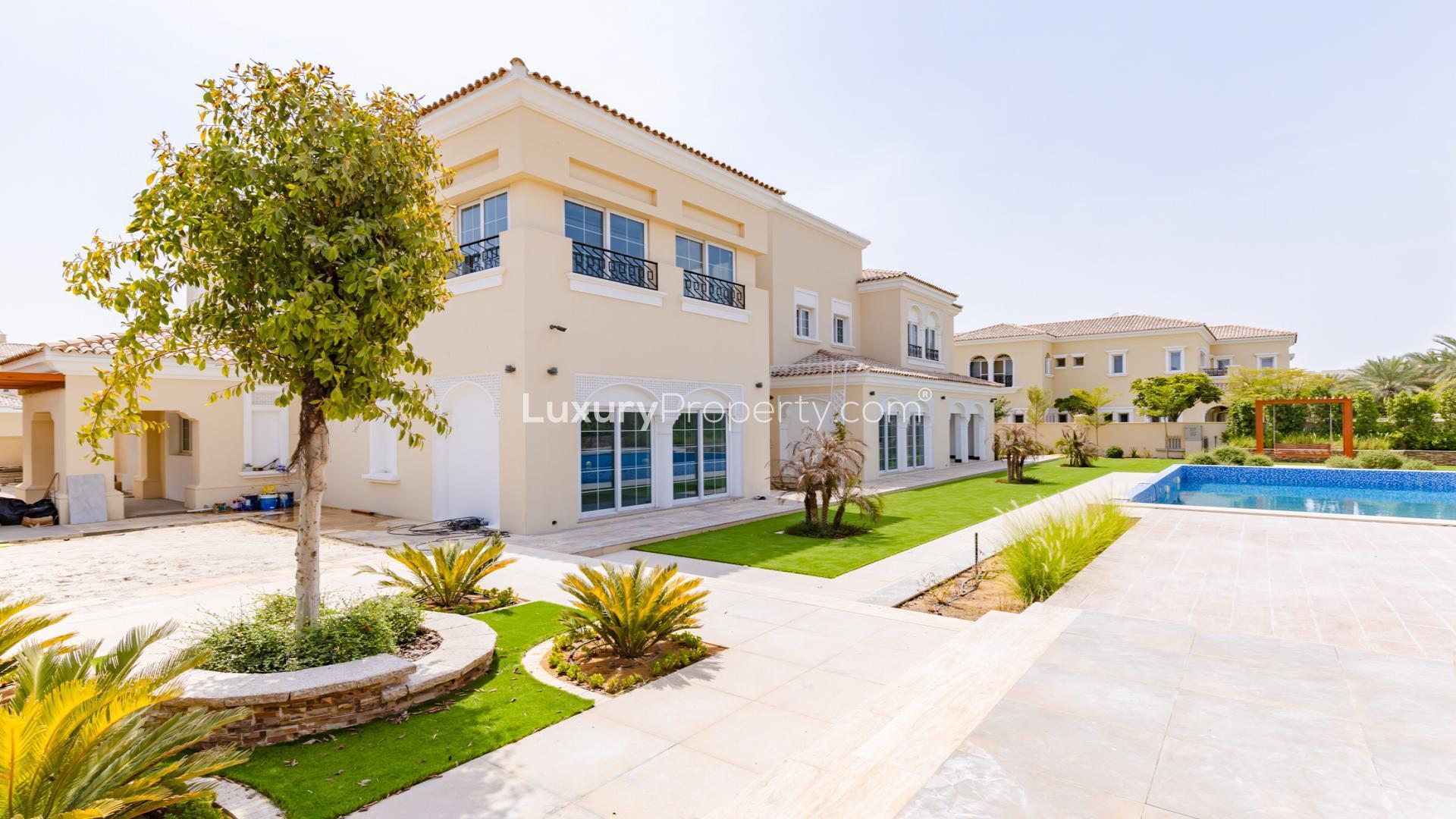 Spacious living room in Polo Homes villa, Arabian Ranches with garden view and natural light