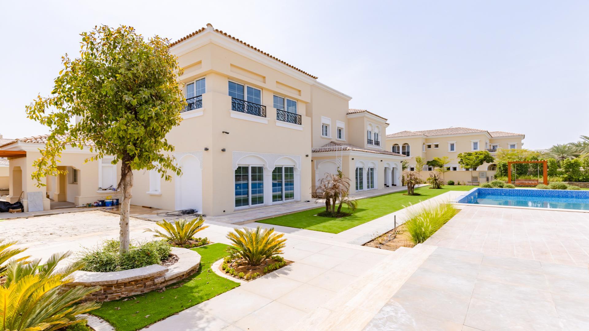 Spacious living room in Polo Homes villa, Arabian Ranches with garden view and natural light