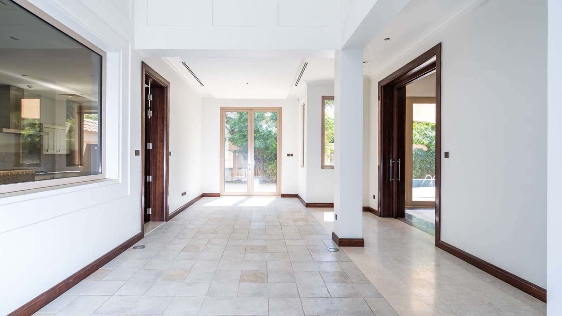 6-bedroom villa exterior with spacious driveway in Al Barari, Camellia, available for rent