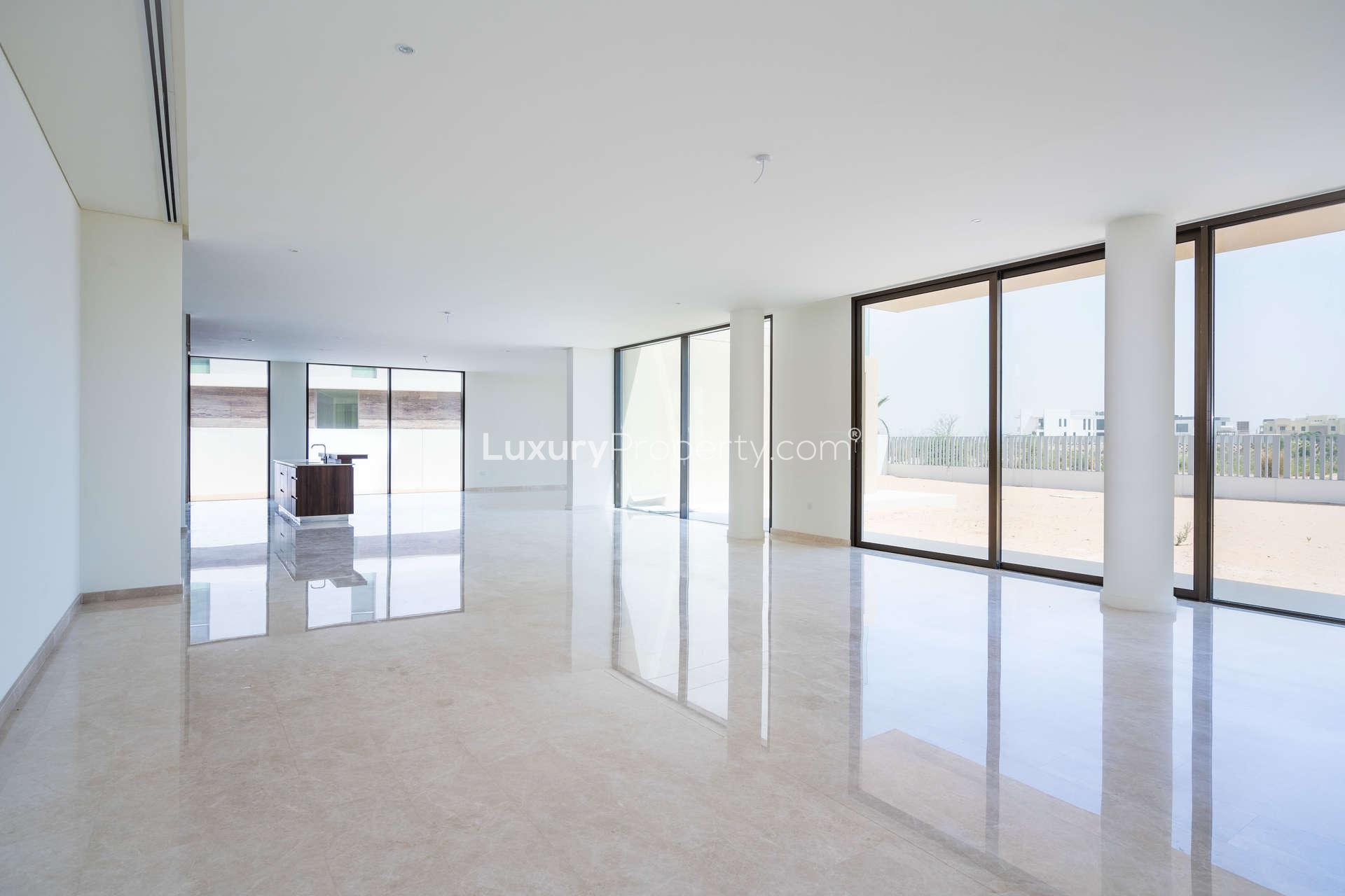 Modern kitchen with island in 6-bedroom villa, Fairway Vistas, Dubai Hills Estate