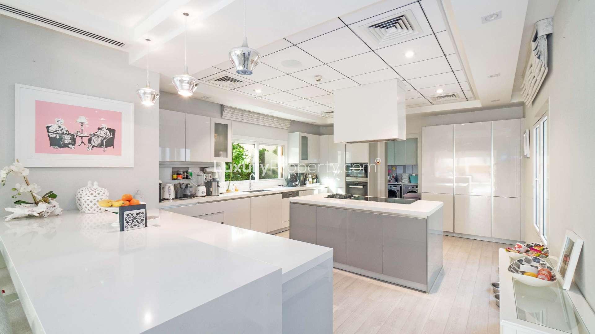 Modern kitchen in 6-bedroom villa, Redwood Avenue, Jumeirah Golf Estates, available for rent