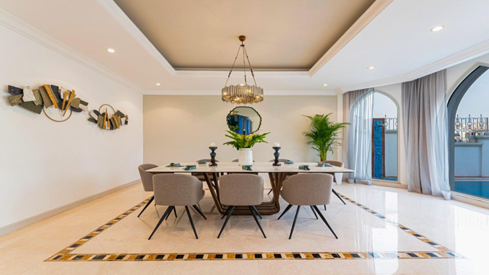 Furnished dining and living area in Palm Jumeirah Garden Homes villa for rent