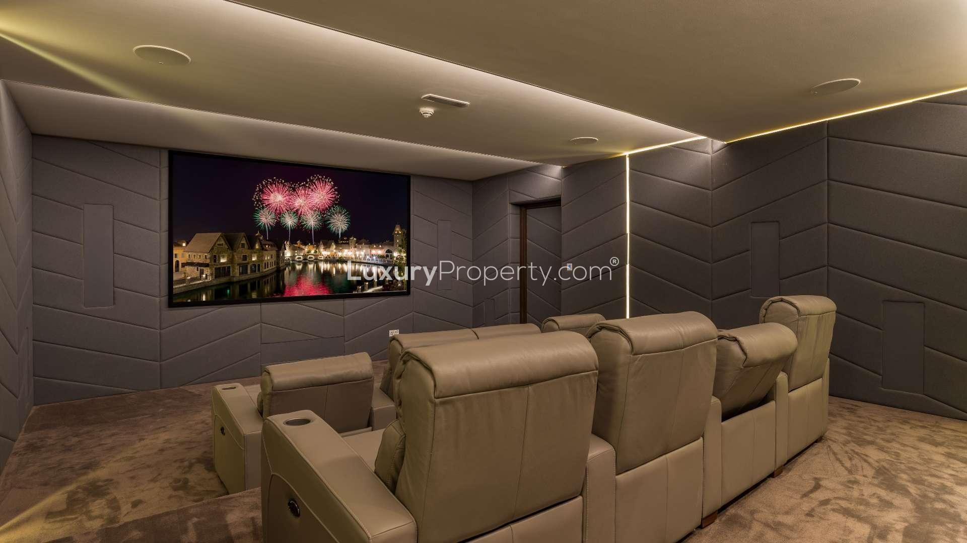 Luxurious living room in 6-bedroom villa, Hillside, Jumeirah Golf Estates, with pool view