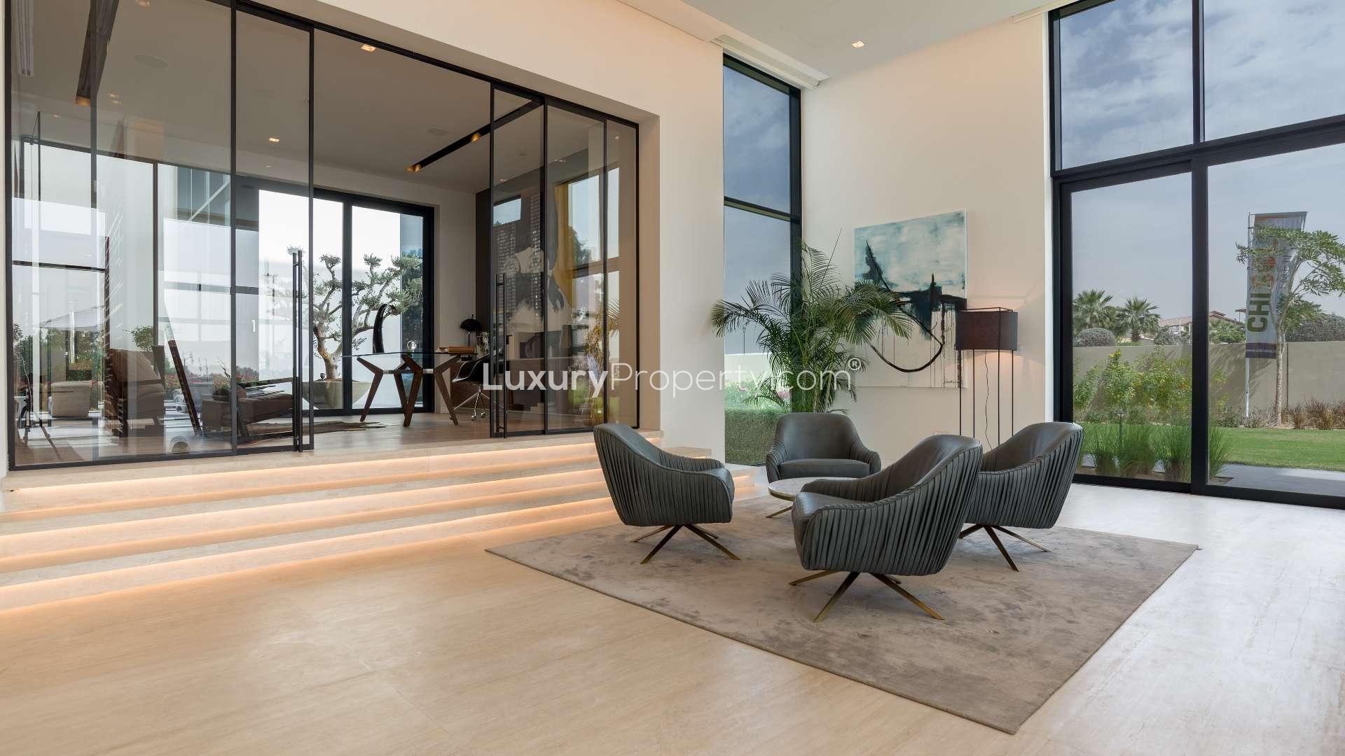 Luxurious villa interior at Hillside, Jumeirah Golf Estates with modern seating and large windows