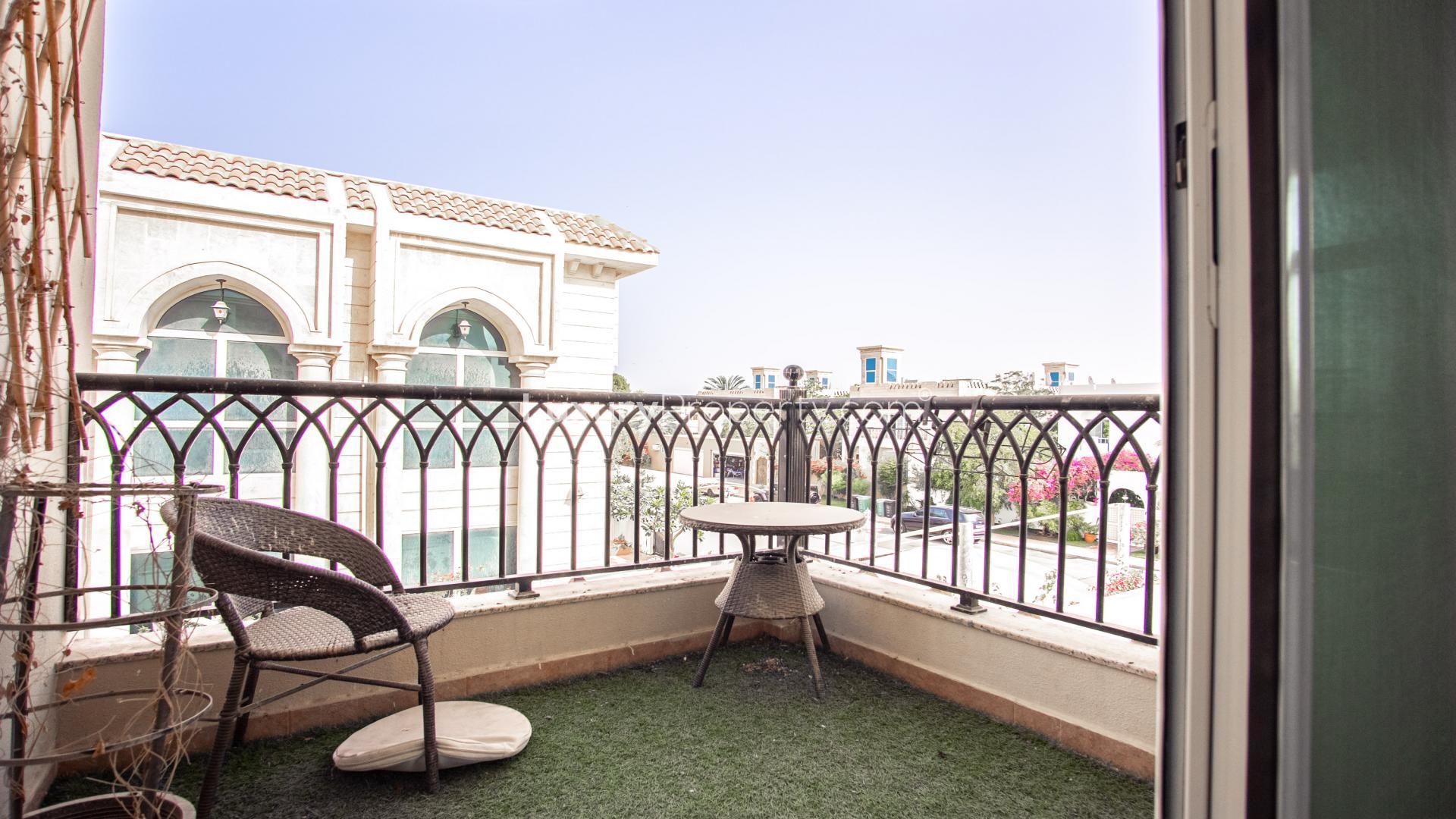 Exterior view of luxury 6-bedroom villa for rent in Jumeirah 3, lush garden