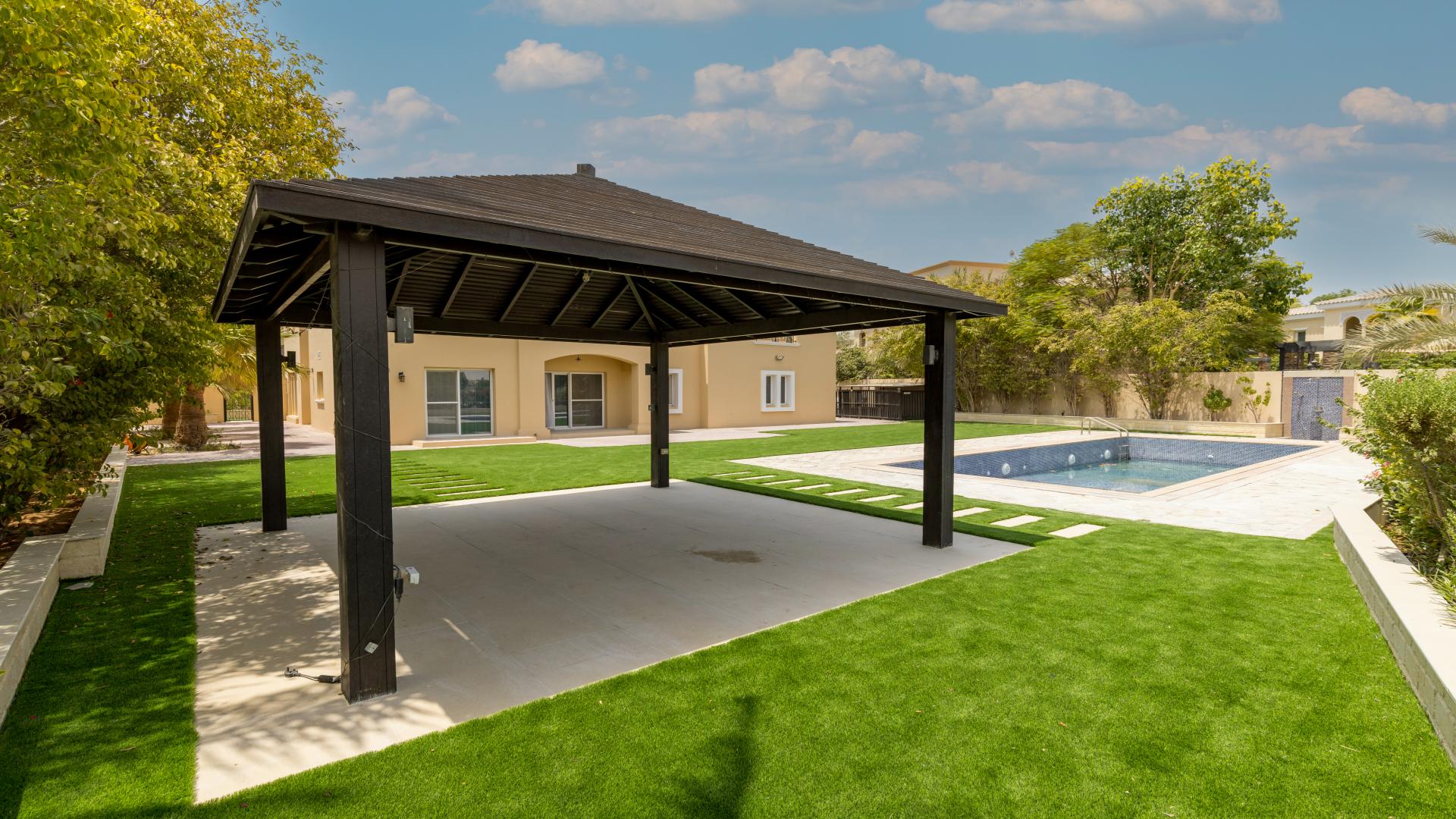 Luxury villa garden with gazebo and pool in Arabian Ranches, La Avenida community