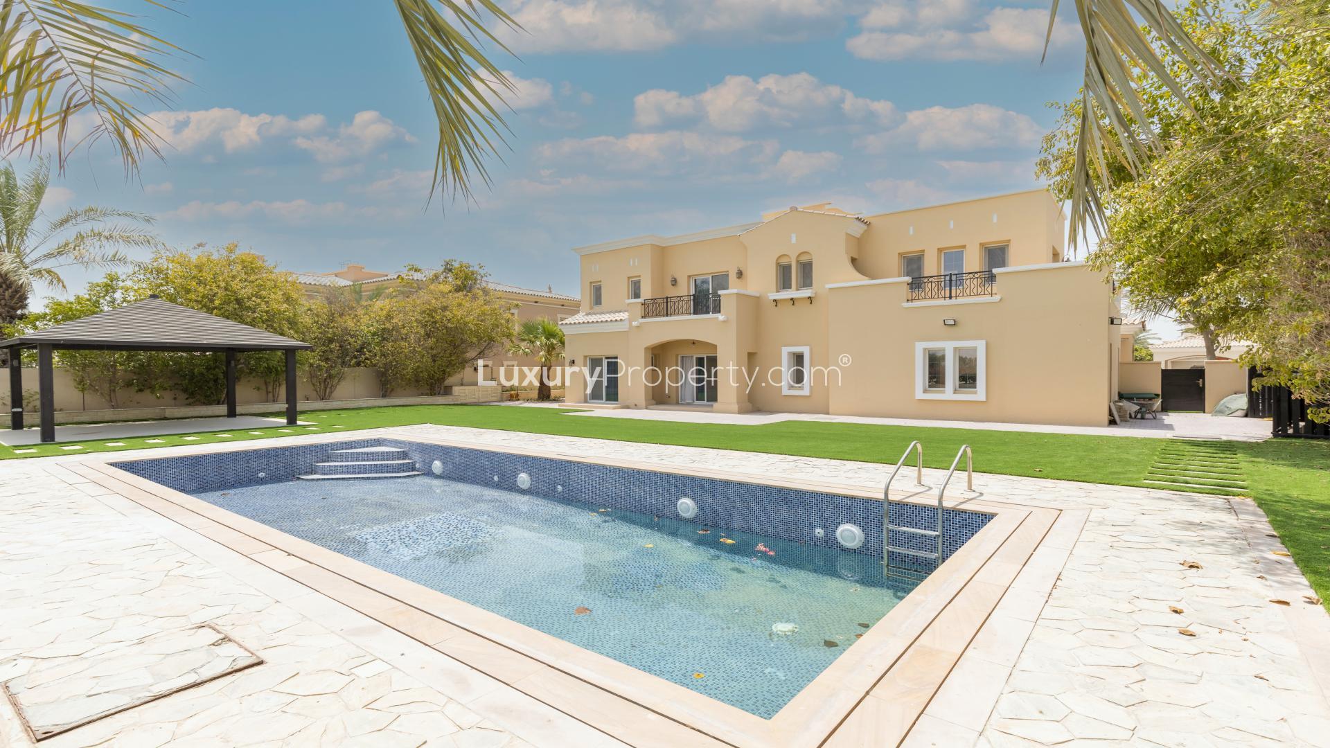 "Villa with pool and golf course view in Arabian Ranches, La Avenida community.",Upgraded villa with pool and garden in Arabian Ranches' La Avenida community