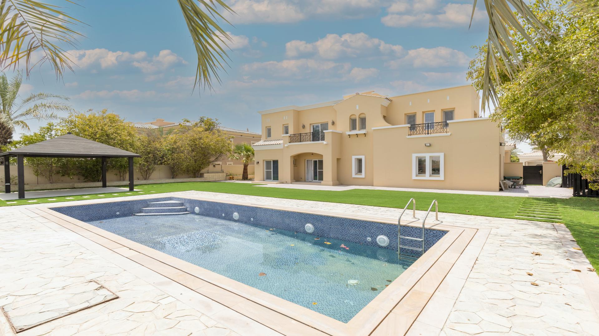 "Villa with pool and golf course view in Arabian Ranches, La Avenida community.",Upgraded villa with pool and garden in Arabian Ranches' La Avenida community