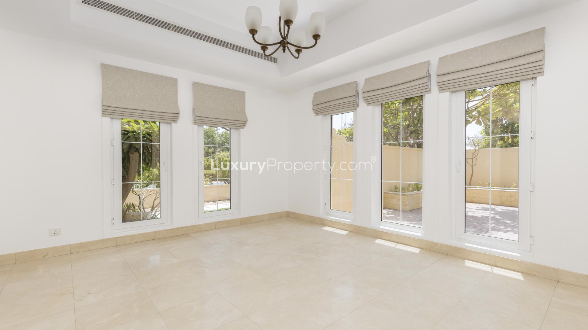 Outdoor pool area of 6-bedroom villa in Mirador, Arabian Ranches for rent