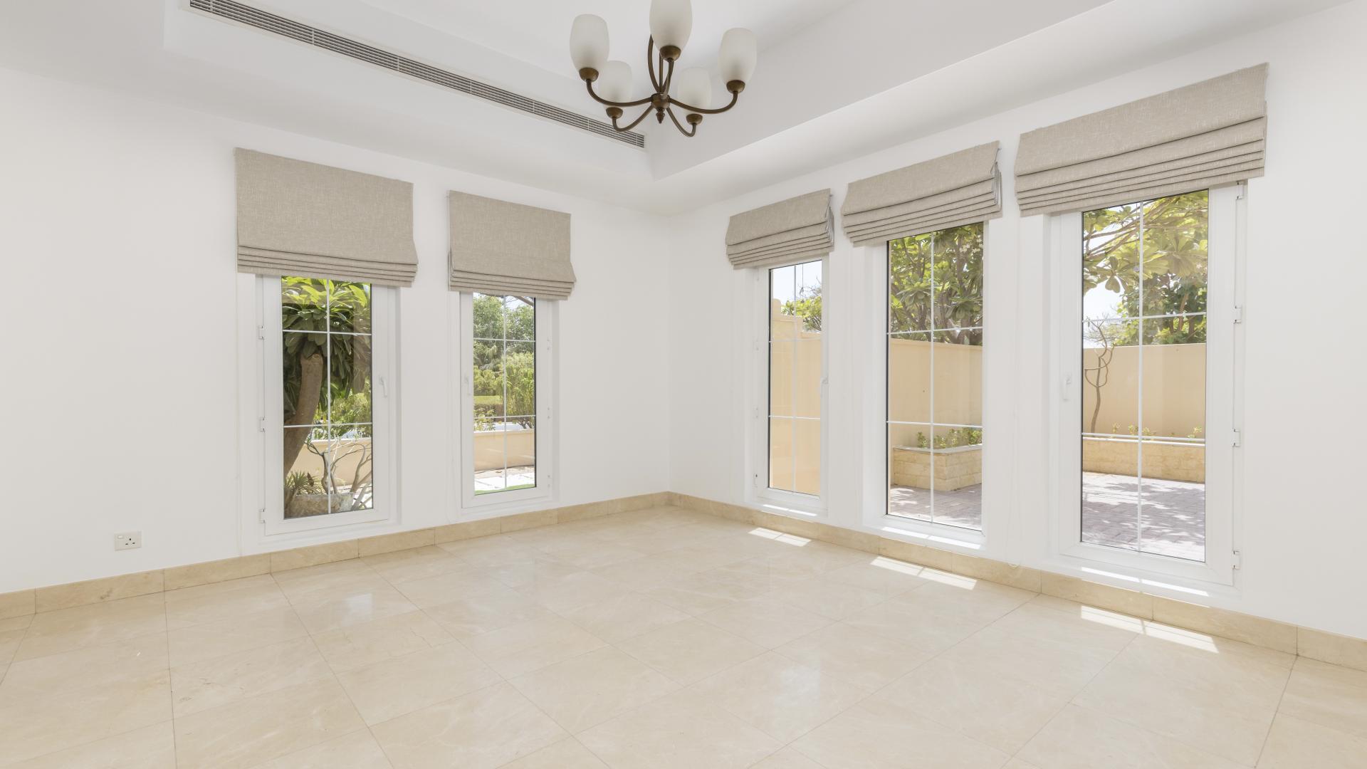 Outdoor pool area of 6-bedroom villa in Mirador, Arabian Ranches for rent