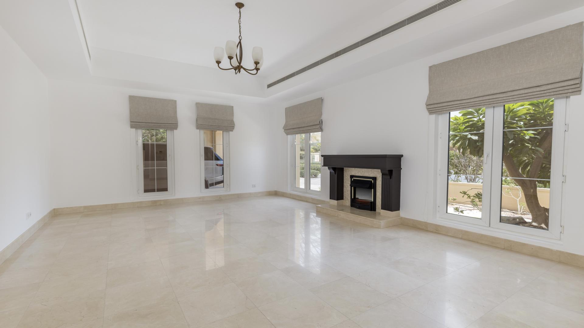 Bright living room with large windows in Mirador villa, Arabian Ranches