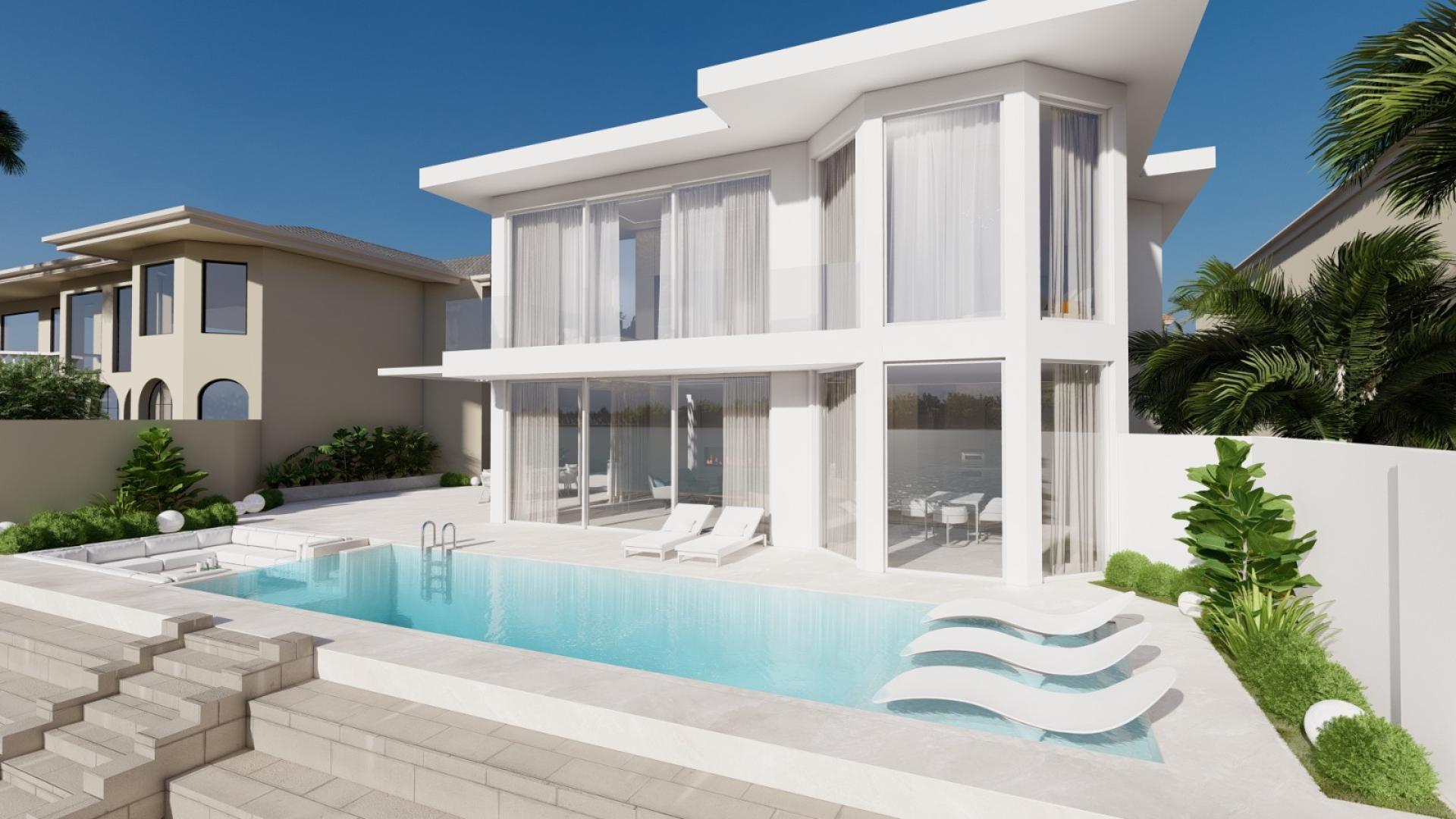 Outdoor patio with dining area and ocean view at Palm Jumeirah villa, Frond B