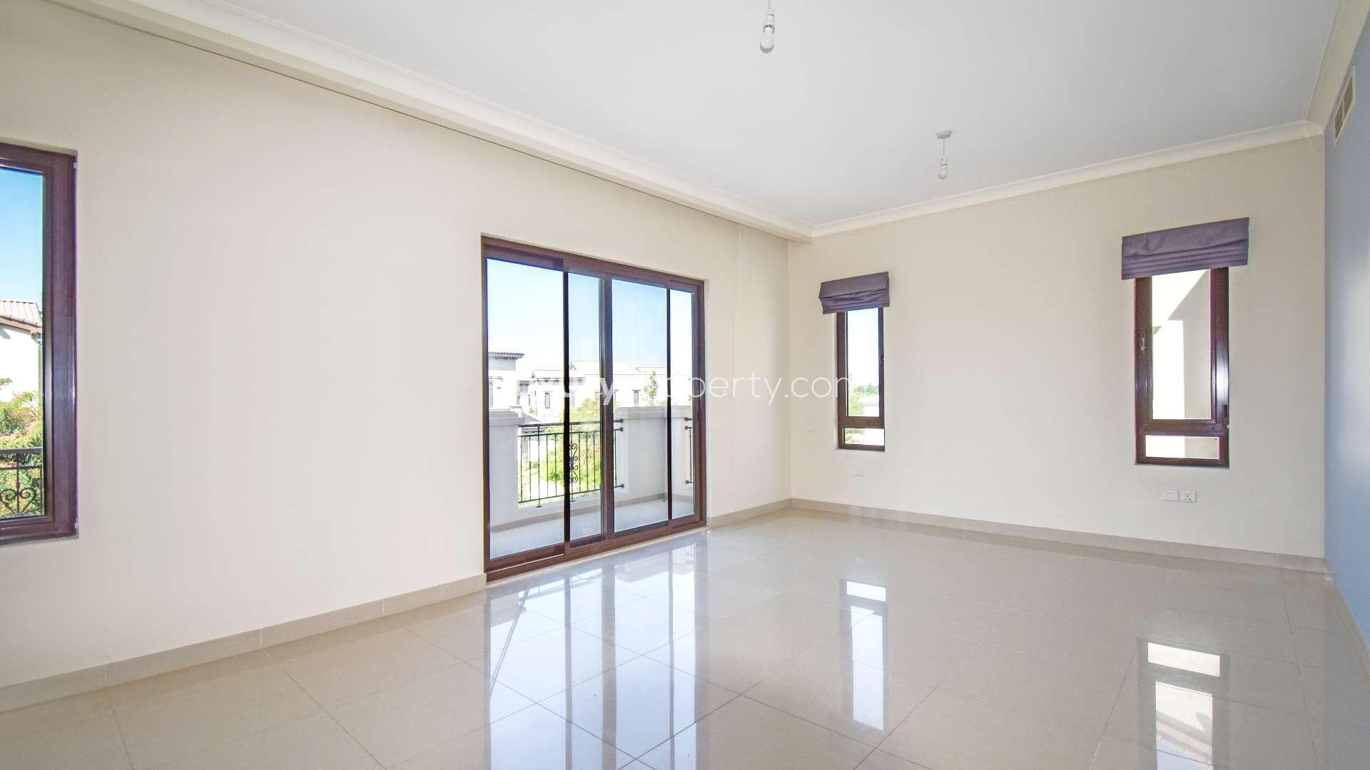 Spacious living room with large windows in six-bedroom villa, Arabian Ranches 2, Rosa community