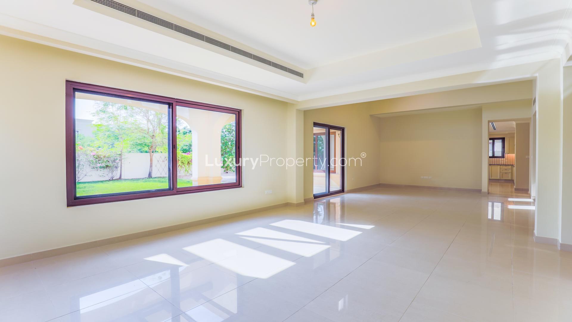 Beautiful villa exterior with lush garden in Rosa, Arabian Ranches 2, available for rent