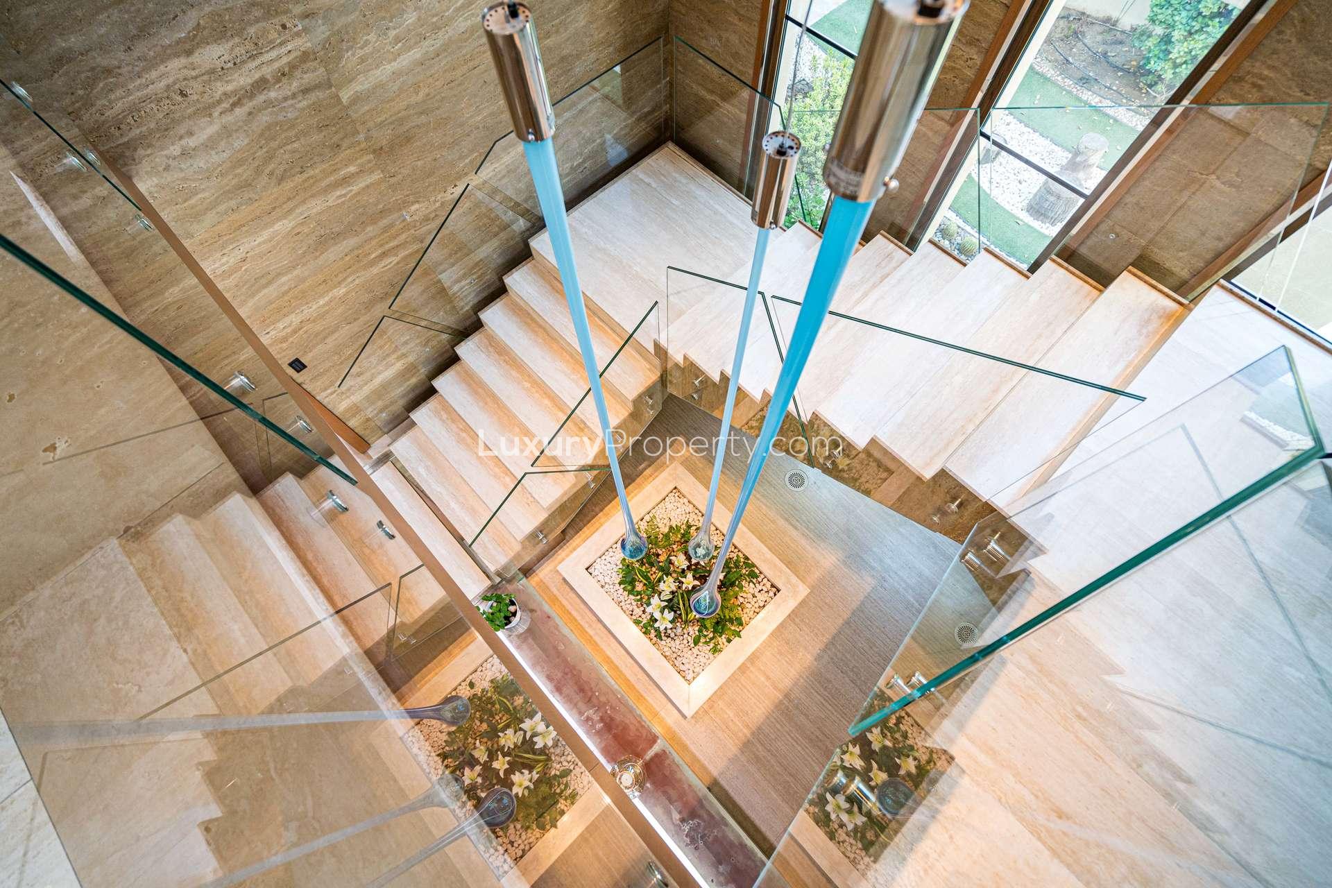 Luxurious Emirates Hills villa interior with modern decor and wooden accents in spacious living area