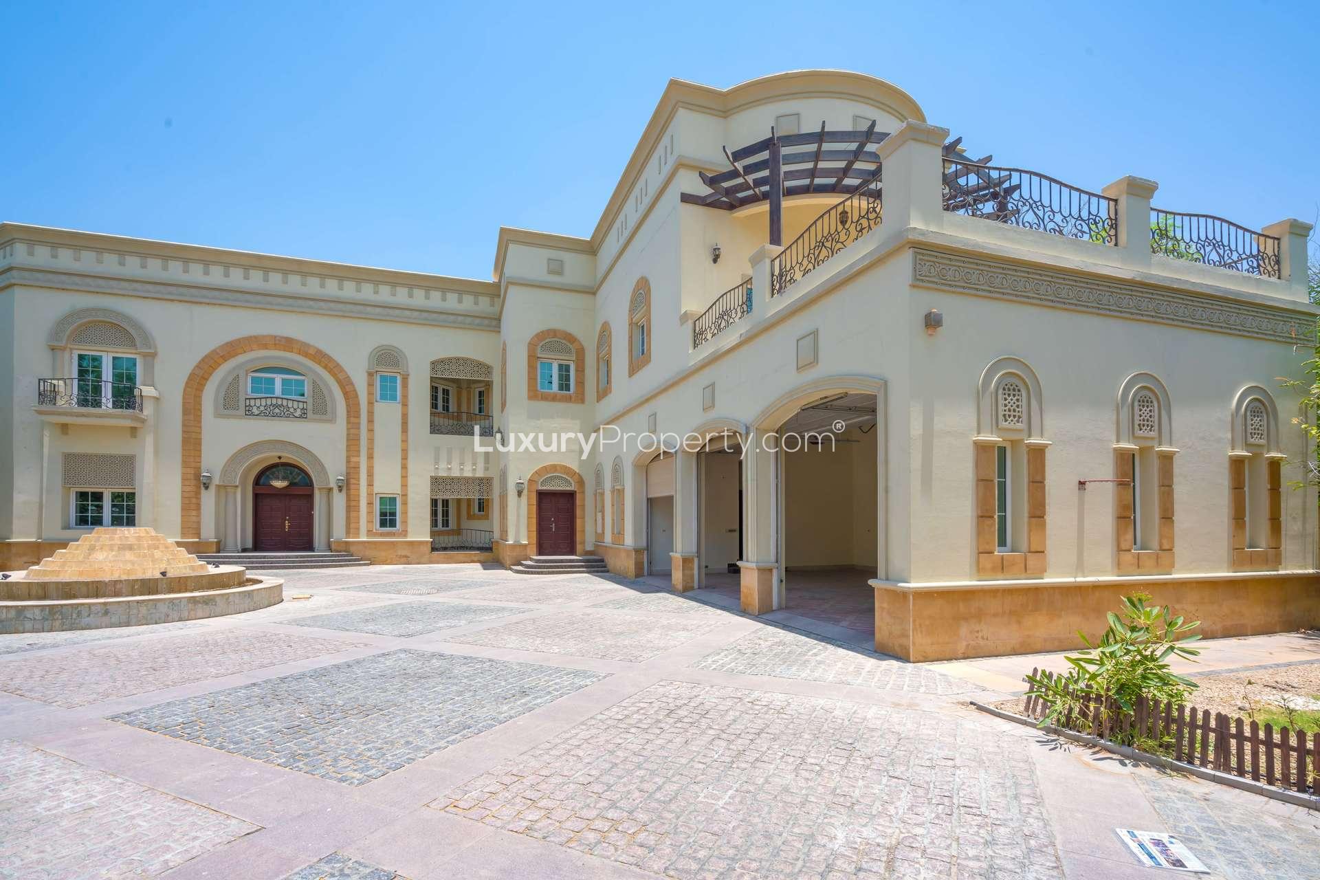 Stunning Emirates Hills villa exterior with fountain, available for rent, six bedrooms, Sector W