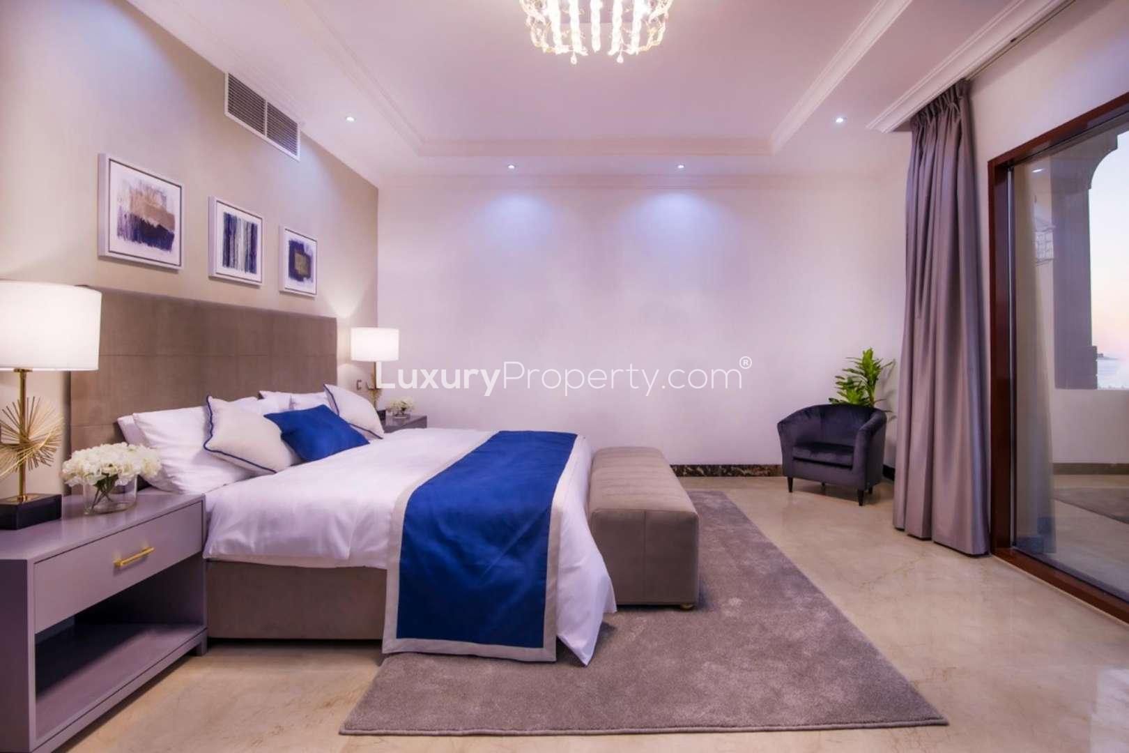 Luxurious living room in 6-bedroom villa, Palm Jumeirah, featuring elegant decor and modern furniture