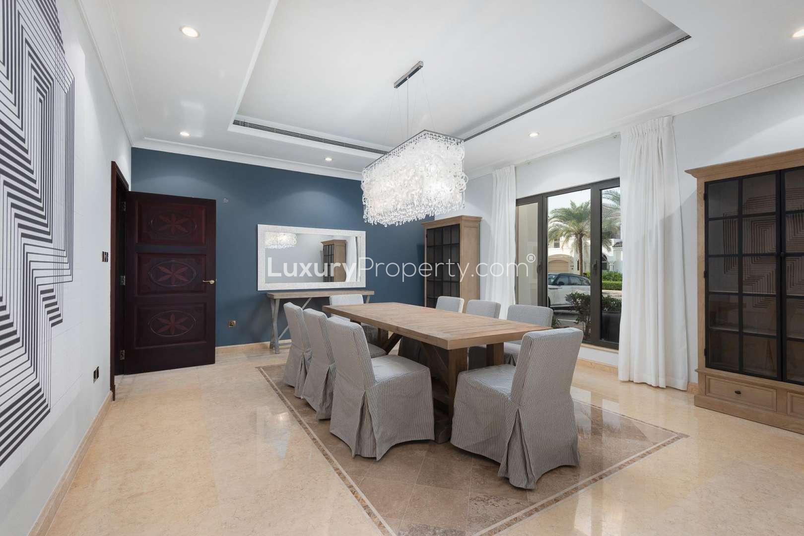 Luxurious living room in Palm Jumeirah villa with elegant decor and modern furnishings