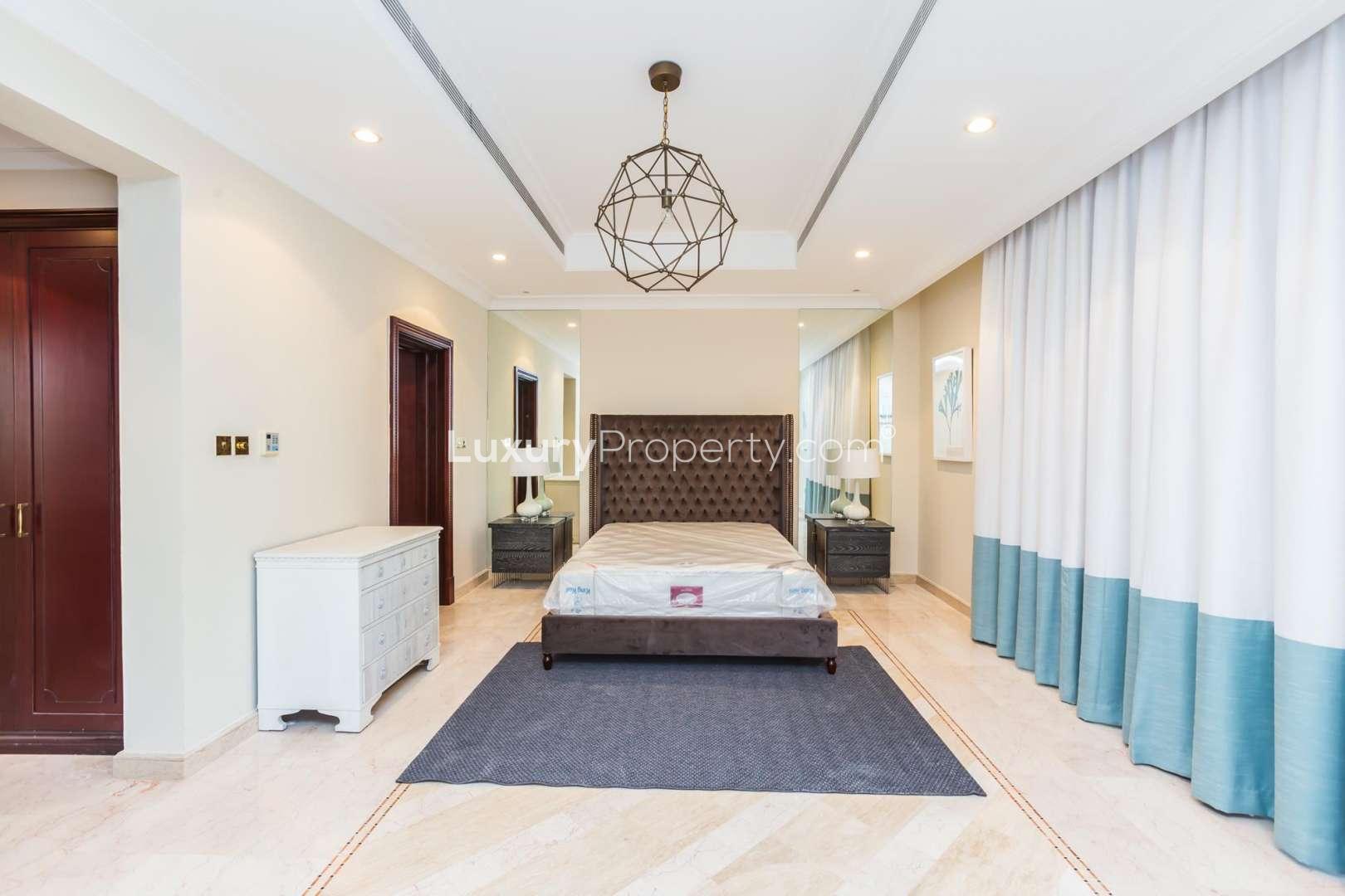 Luxurious villa interior with balcony view on Palm Jumeirah, Dubai. Short-term rental