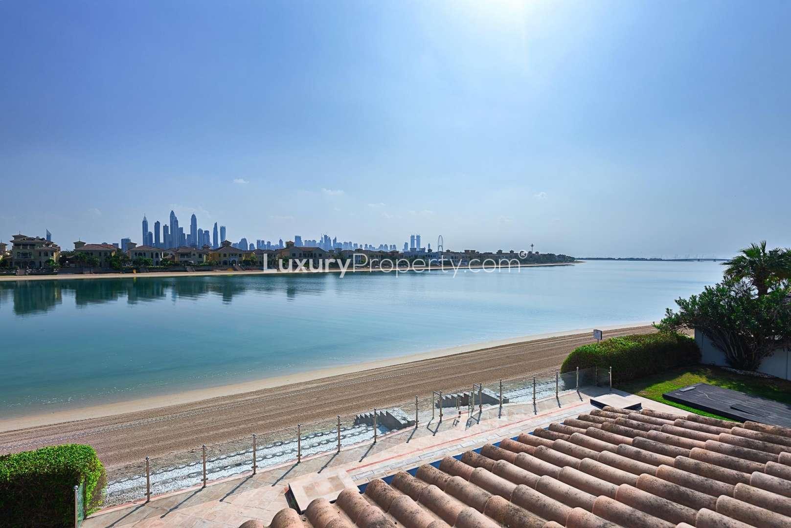 Signature Villa exterior on Palm Jumeirah beach, available for short-term rental, 6 bedrooms