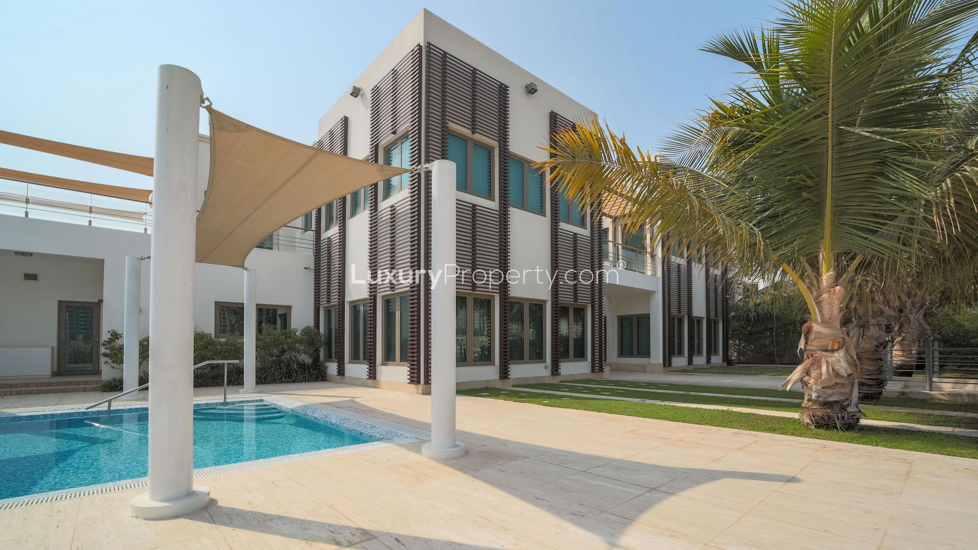 Luxurious poolside view at fully renovated Signature Villa, Palm Jumeirah, Dubai