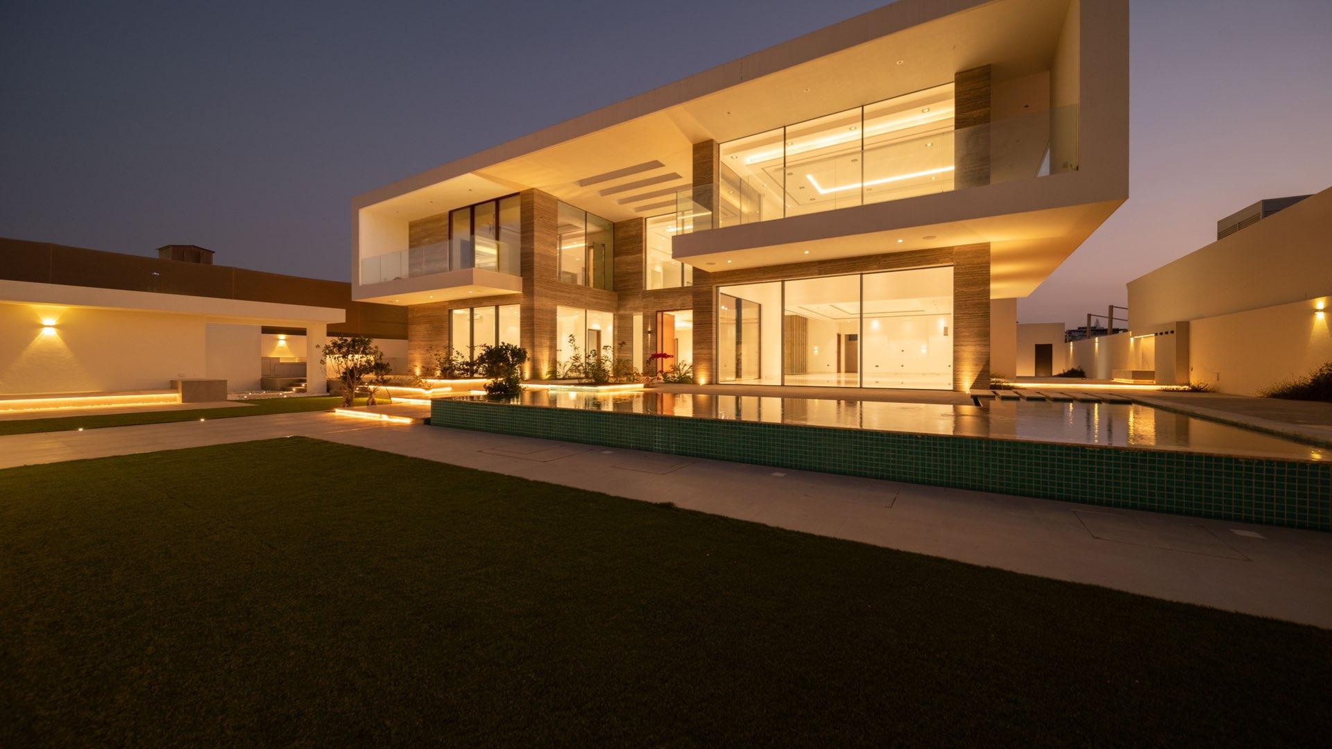 Luxurious villa interior with marble floors and modern staircase in Umm al Sheif, Dubai