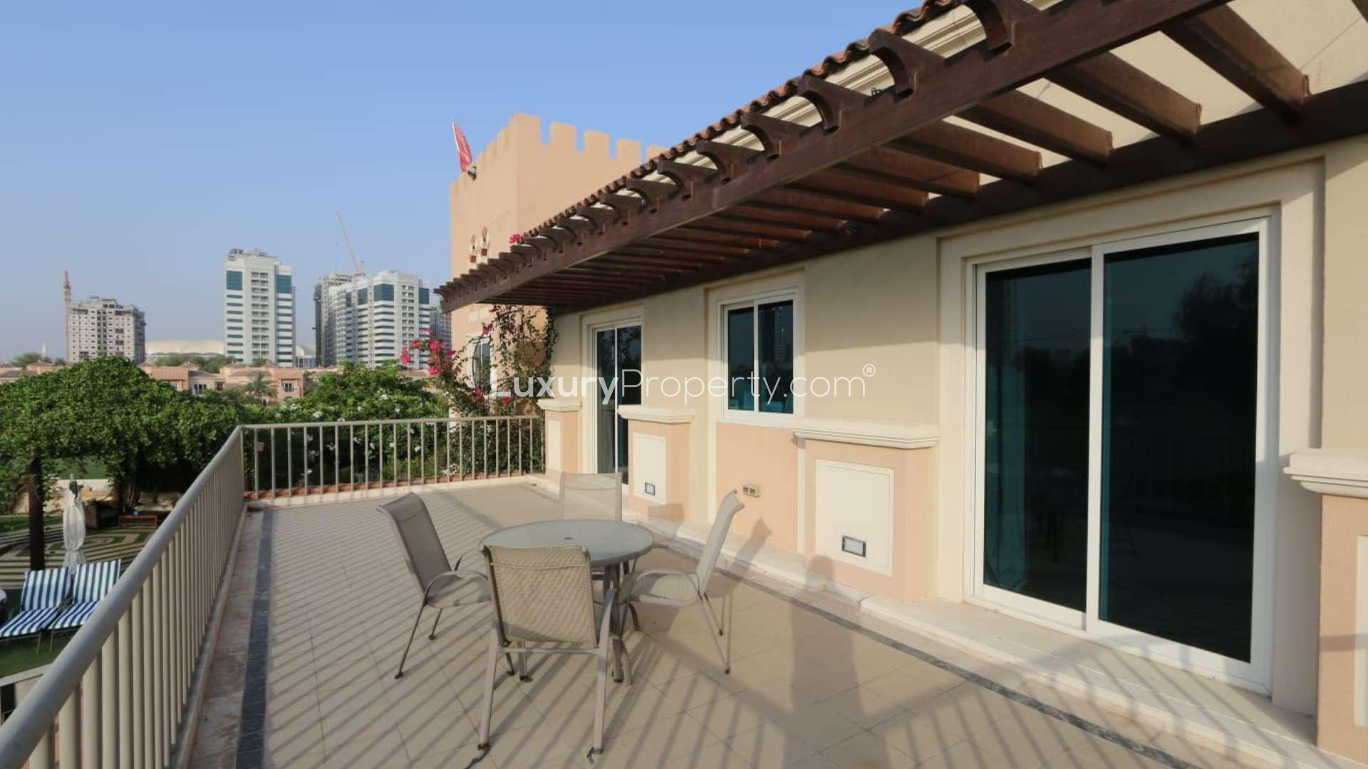 Luxurious villa terrace with lush greenery in Victory Heights, Dubai Sports City