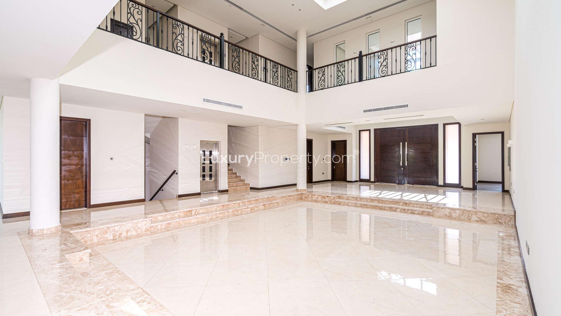 Bright, spacious living room in elegant six-bedroom villa, Jumeirah Golf Estates, for sale