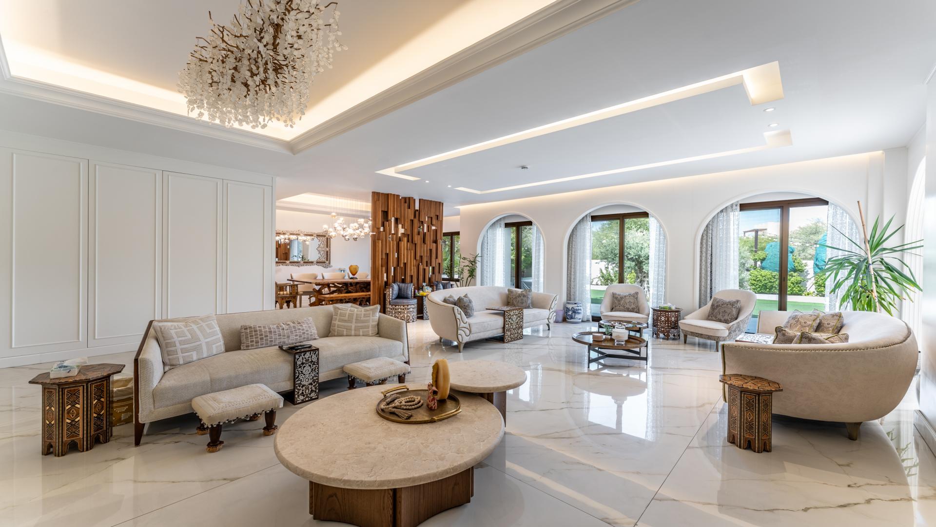 Luxury 4-bedroom villa exterior with landscaped garden in Aseel, Arabian Ranches for sale