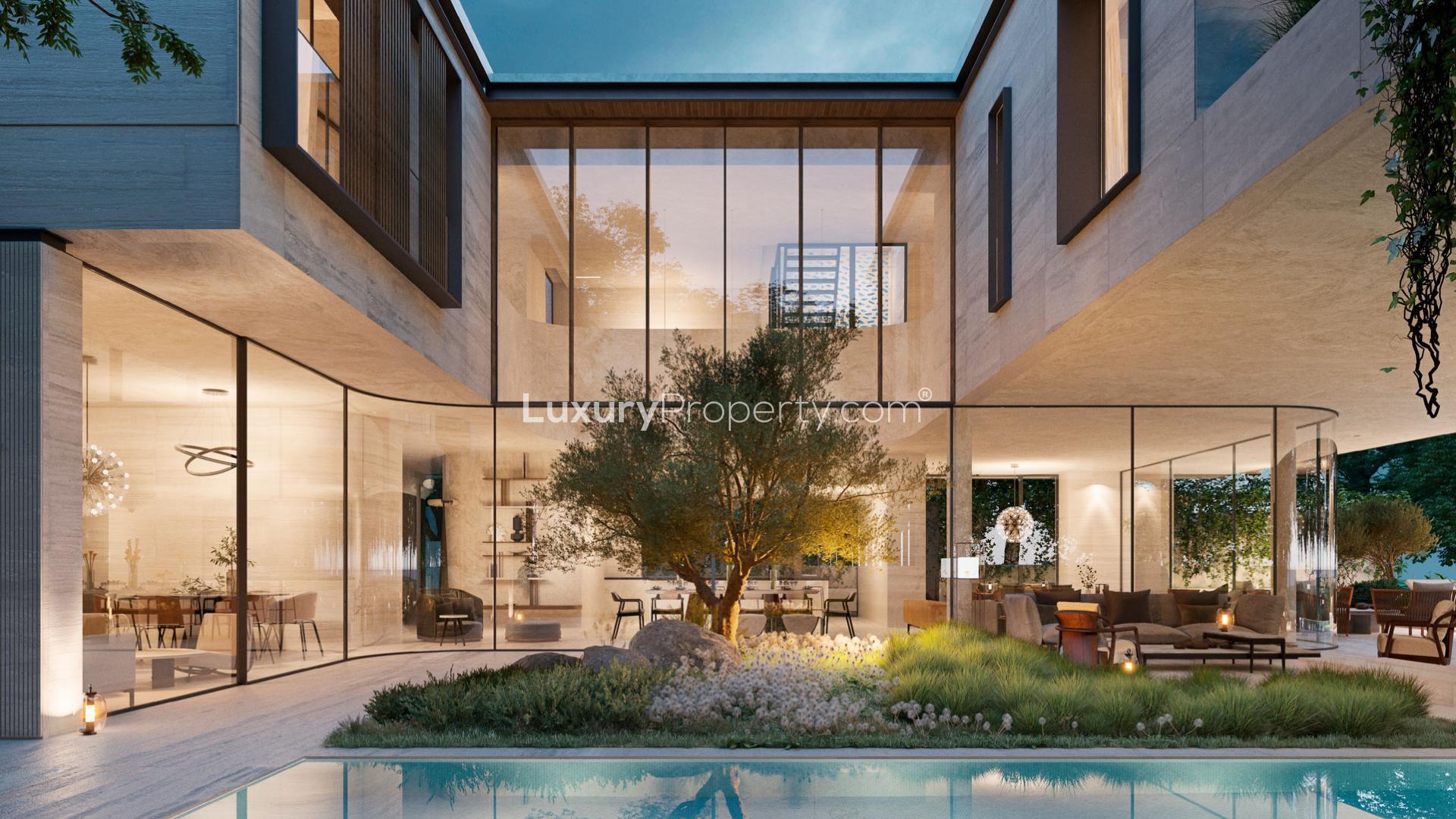 Luxurious 6-bedroom villa exterior in Elysian Mansions, Tilal Al Ghaf, for sale