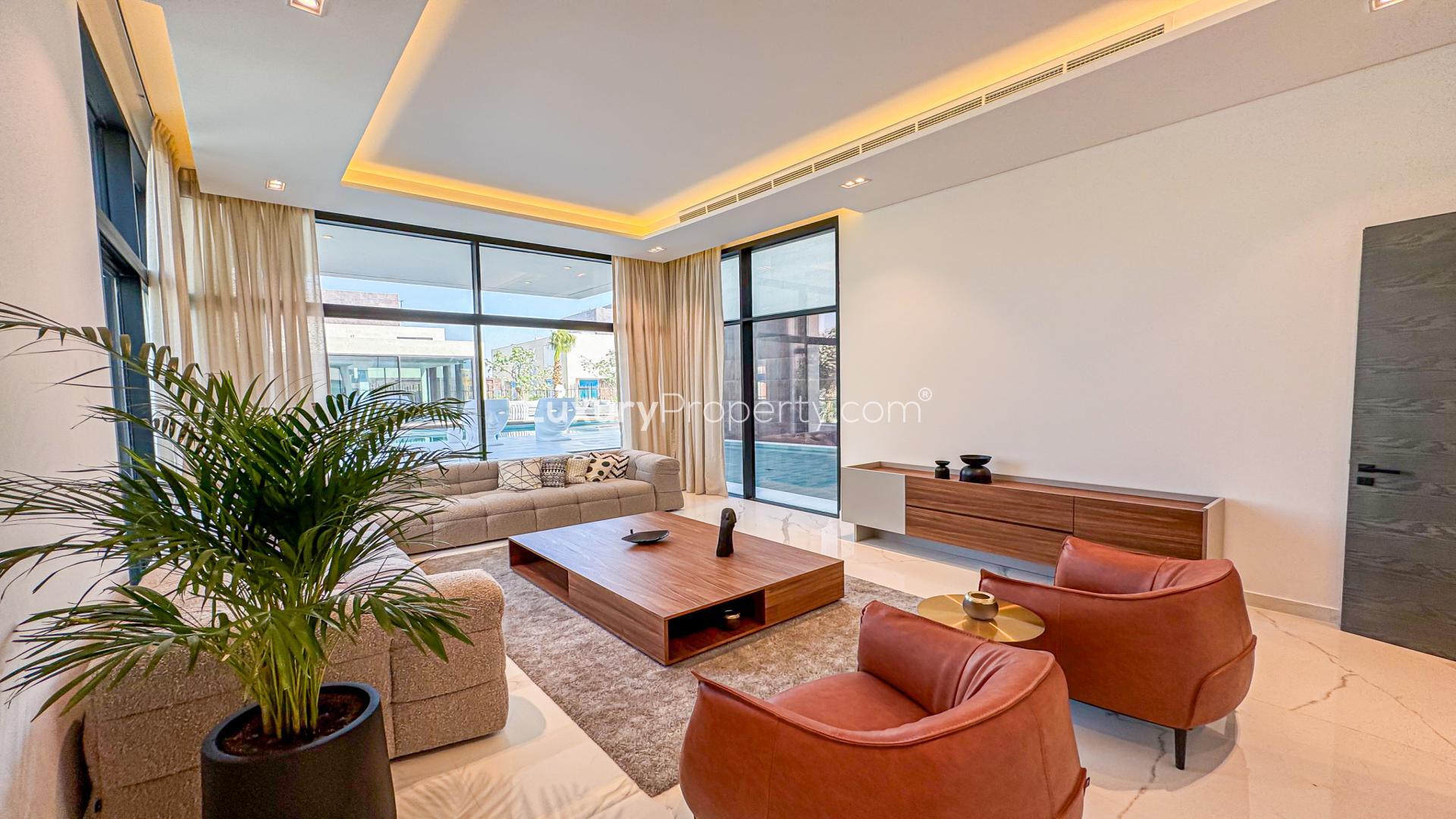 Modern six-bedroom villa exterior in Lunaria, Al Barari, featuring contemporary design and lush greenery