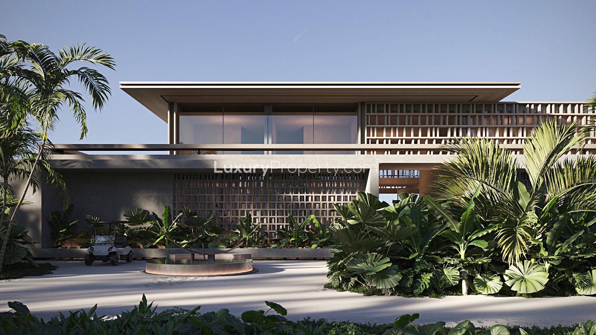 Ultra-exclusive 6-bedroom villa with modern design, lush greenery, and private beach access