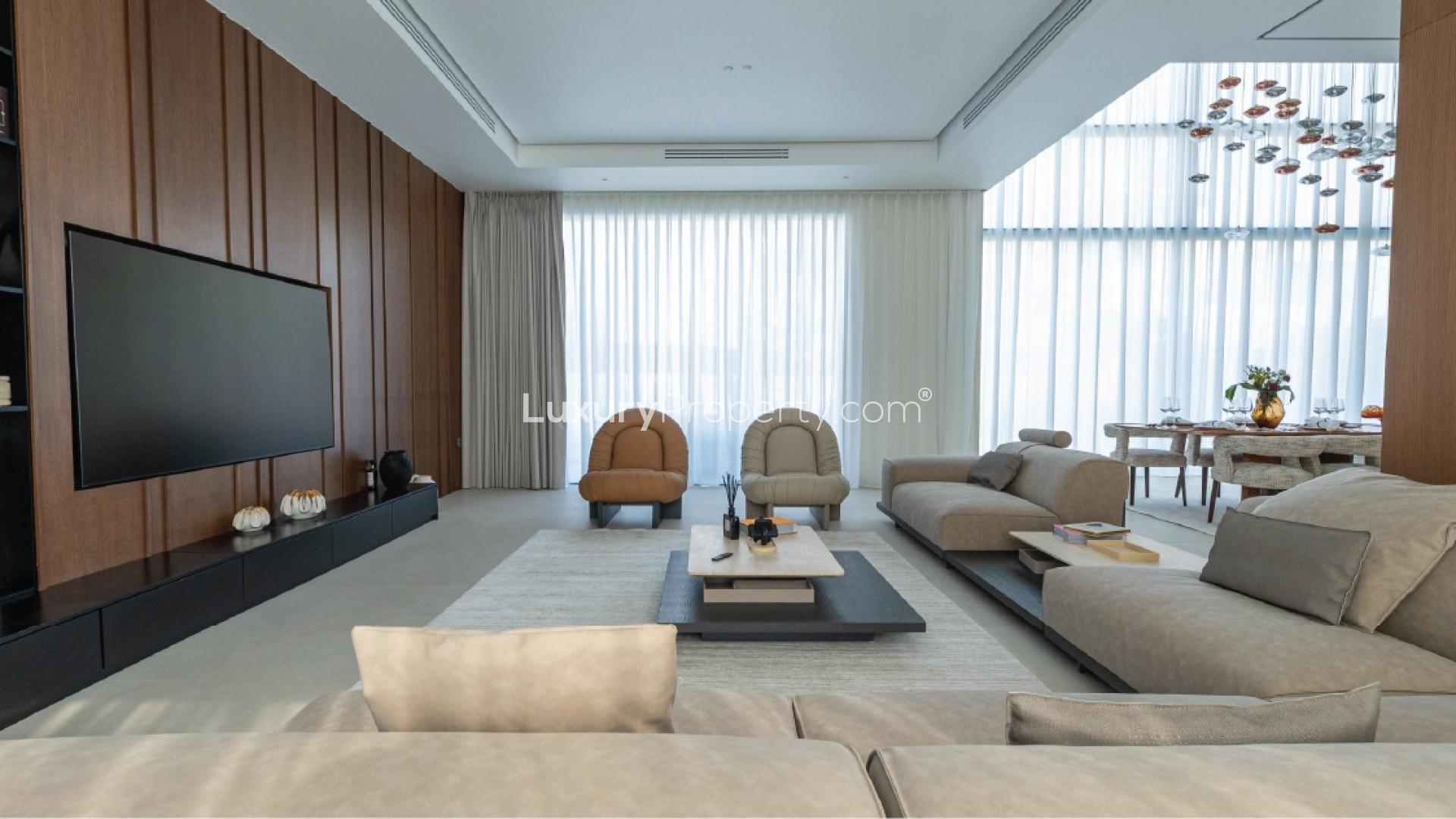 Luxurious dining room in Pearl Jumeirah villa for sale, featuring elegant decor and lighting