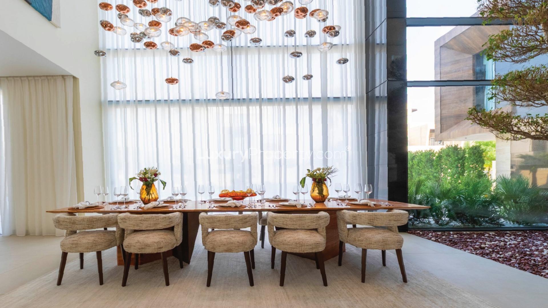 Luxurious dining area in Pearl Jumeirah villa for sale, featuring elegant decor and design