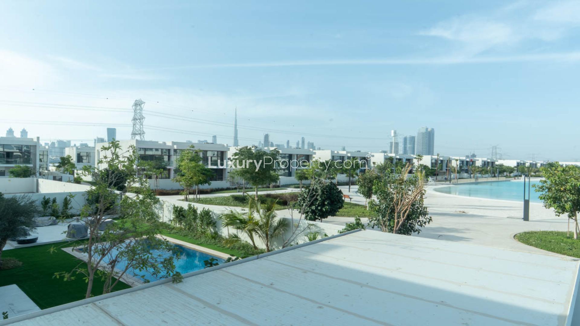 Luxurious villa interior with elegant chandelier in District One Phase III, spacious living area