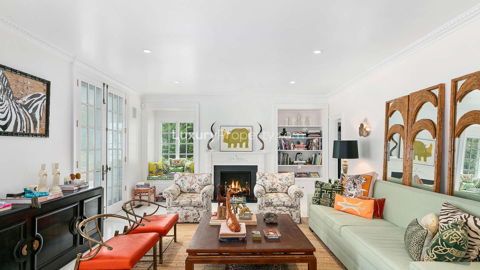 Luxurious living room in six-bedroom villa, 12 Boyesen Road, Hamptons, with cozy fireplace