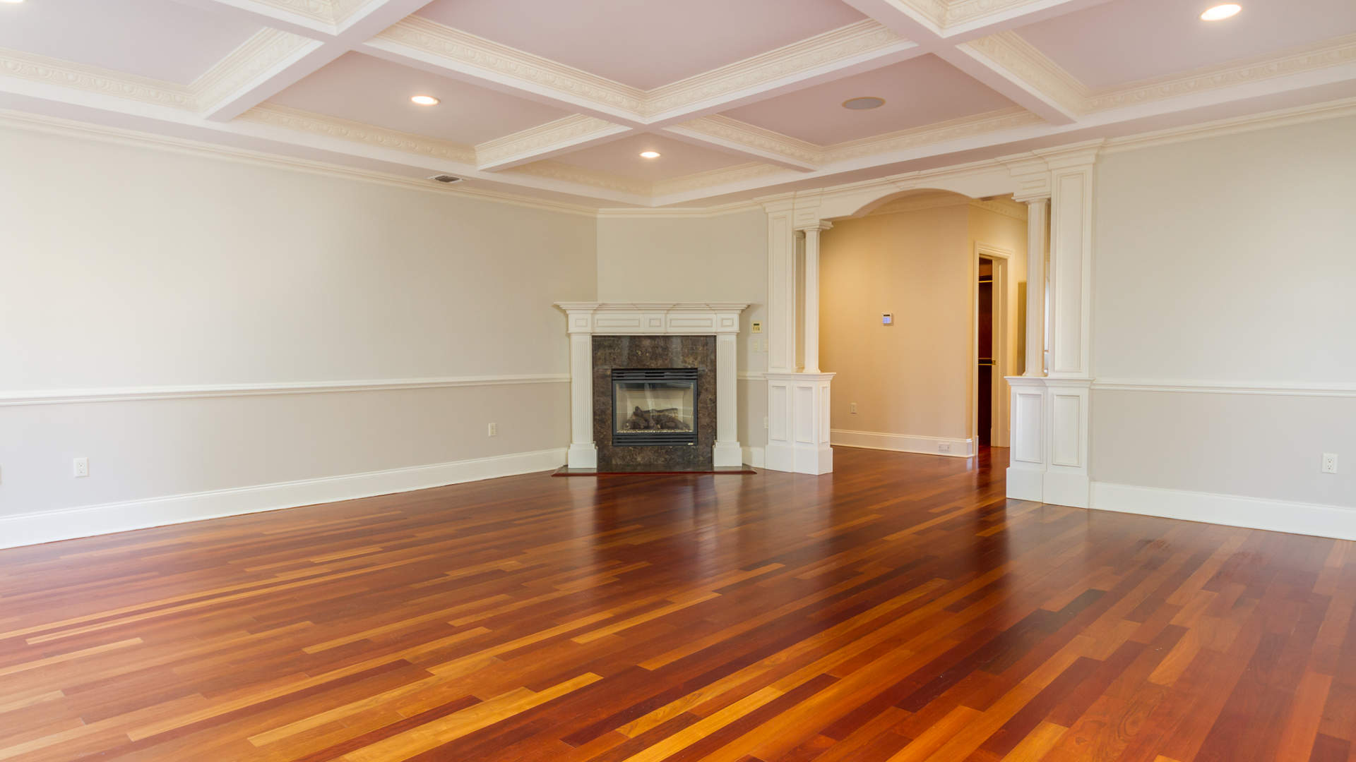 Luxurious wood-paneled room with fireplace in Saddle River villa, New Jersey