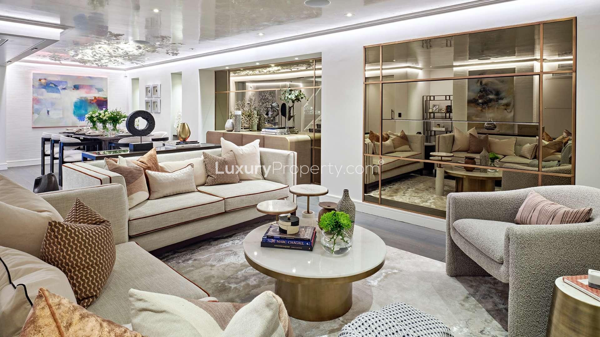 Elegant living room in six-bedroom villa, Herbert Crescent, Knightsbridge, featuring modern decor and fireplace