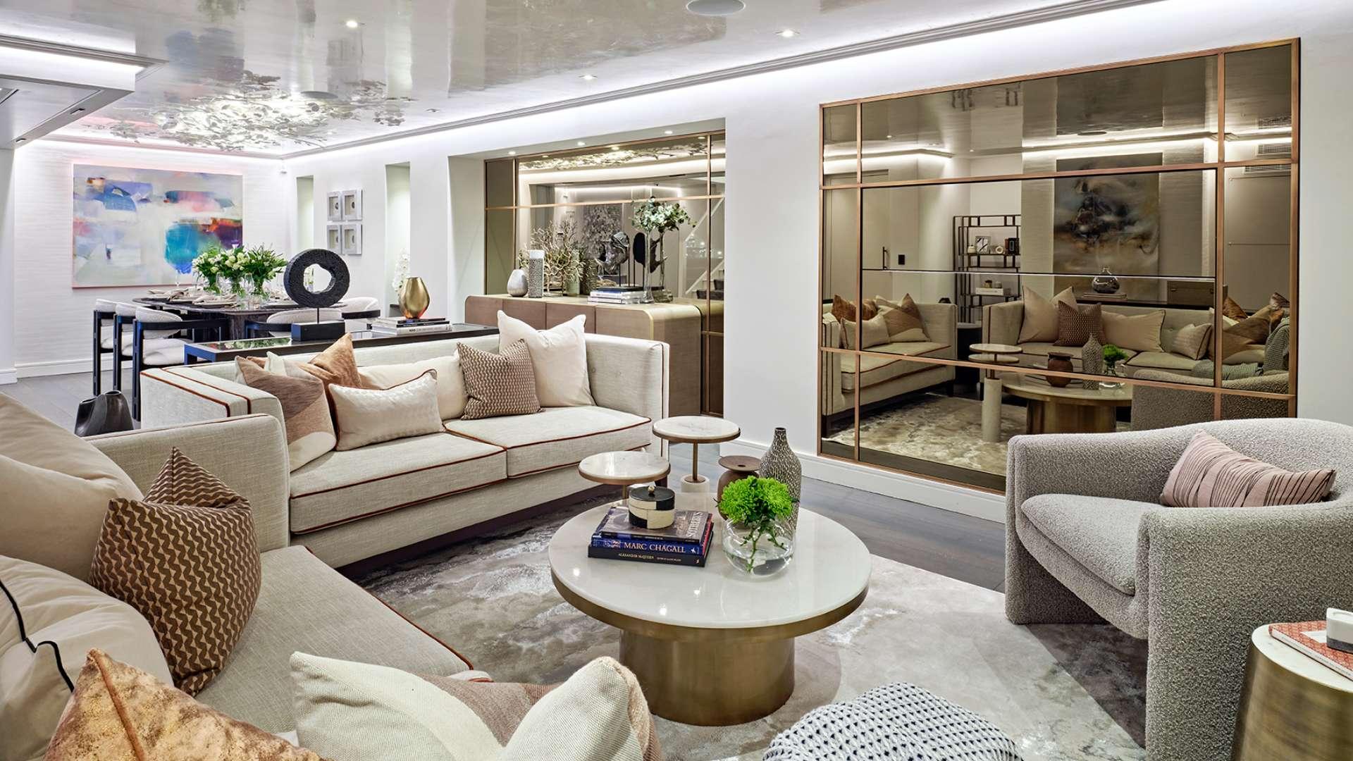Elegant living room in six-bedroom villa, Herbert Crescent, Knightsbridge, featuring modern decor and fireplace