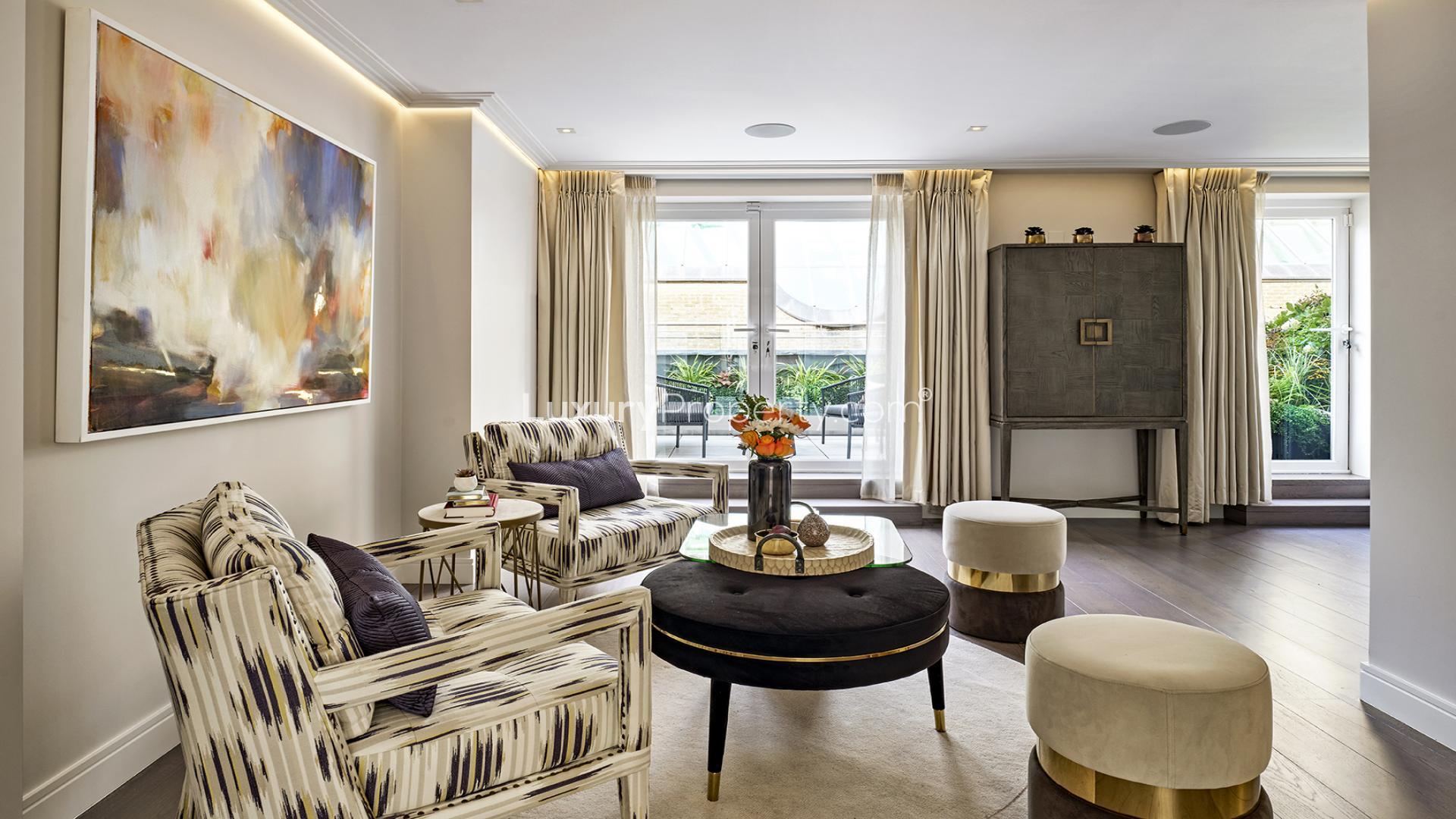 Modern living room in elegant Knightsbridge villa with garden views, spacious seating, and decor