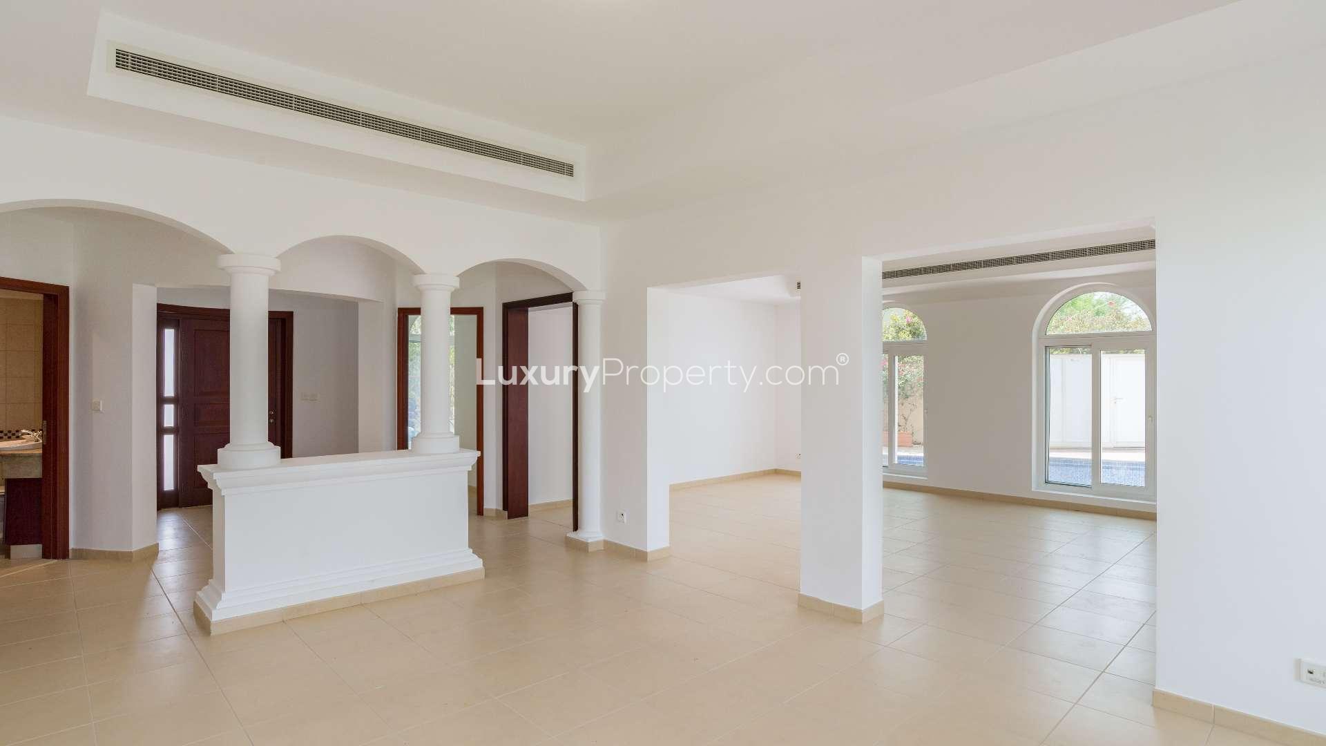 Spacious villa interior with arched windows in Al Mahra, Arabian Ranches, vacant property for sale