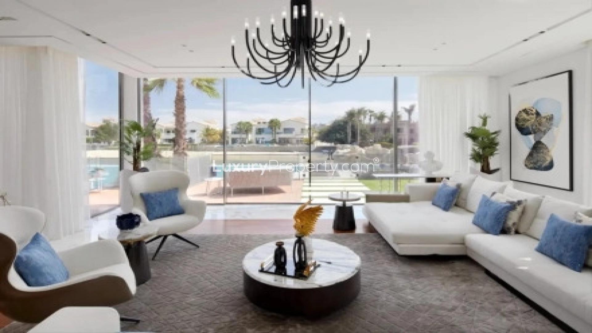 Luxurious poolside view at Signature Villas, Palm Jumeirah, showcasing waterfront living